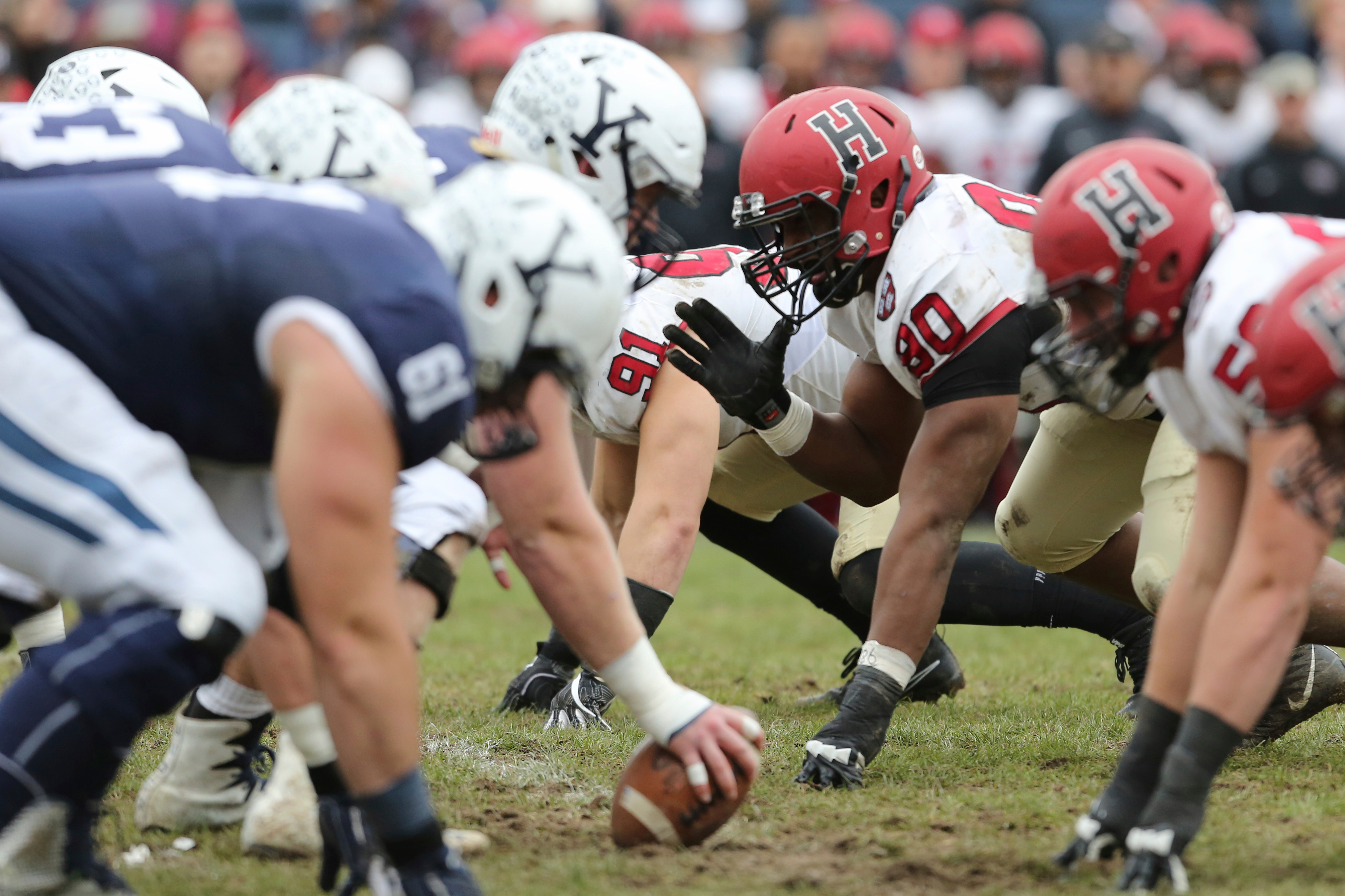FILE - Harvard lines up against against Yale during an NCAA college football game on Saturday, Nov. 18, 2017, in New Haven, Conn.