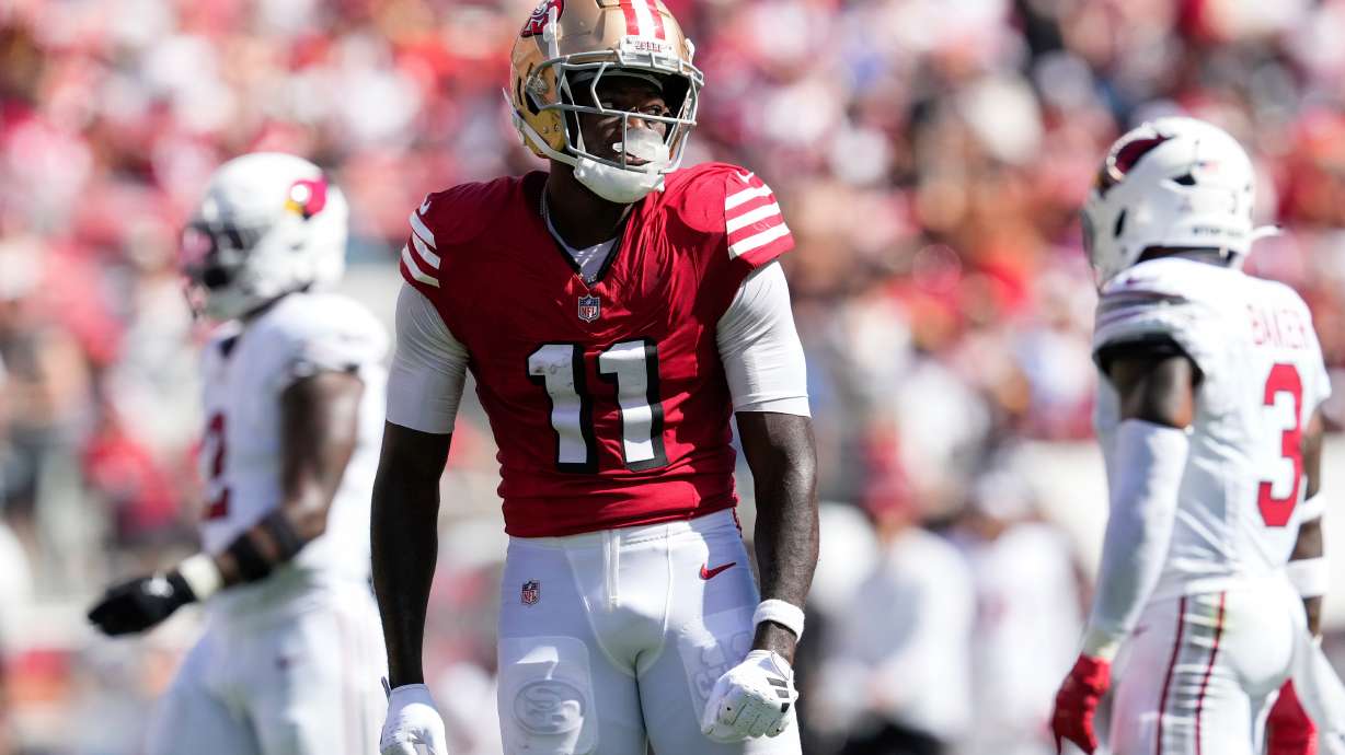 FILE - San Francisco 49ers wide receiver Brandon Aiyuk (11) reacts during the first half of an NFL football game against the Arizona Cardinals, Oct. 6, 2024, in Santa Clara, Calif.