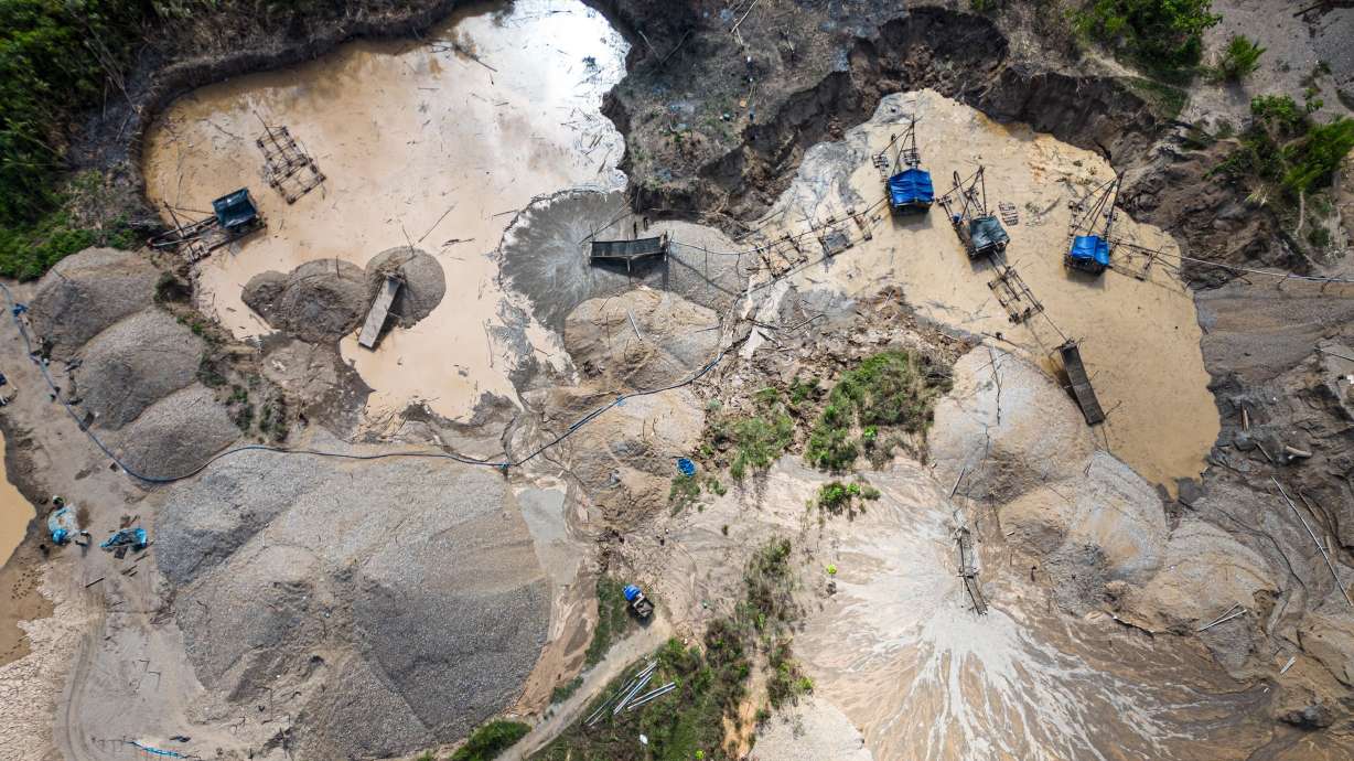 Dredges at an illegal gold mining area in the Madre de Dios department, in Peru's southeastern Amazon region, on May 31, 2024.
