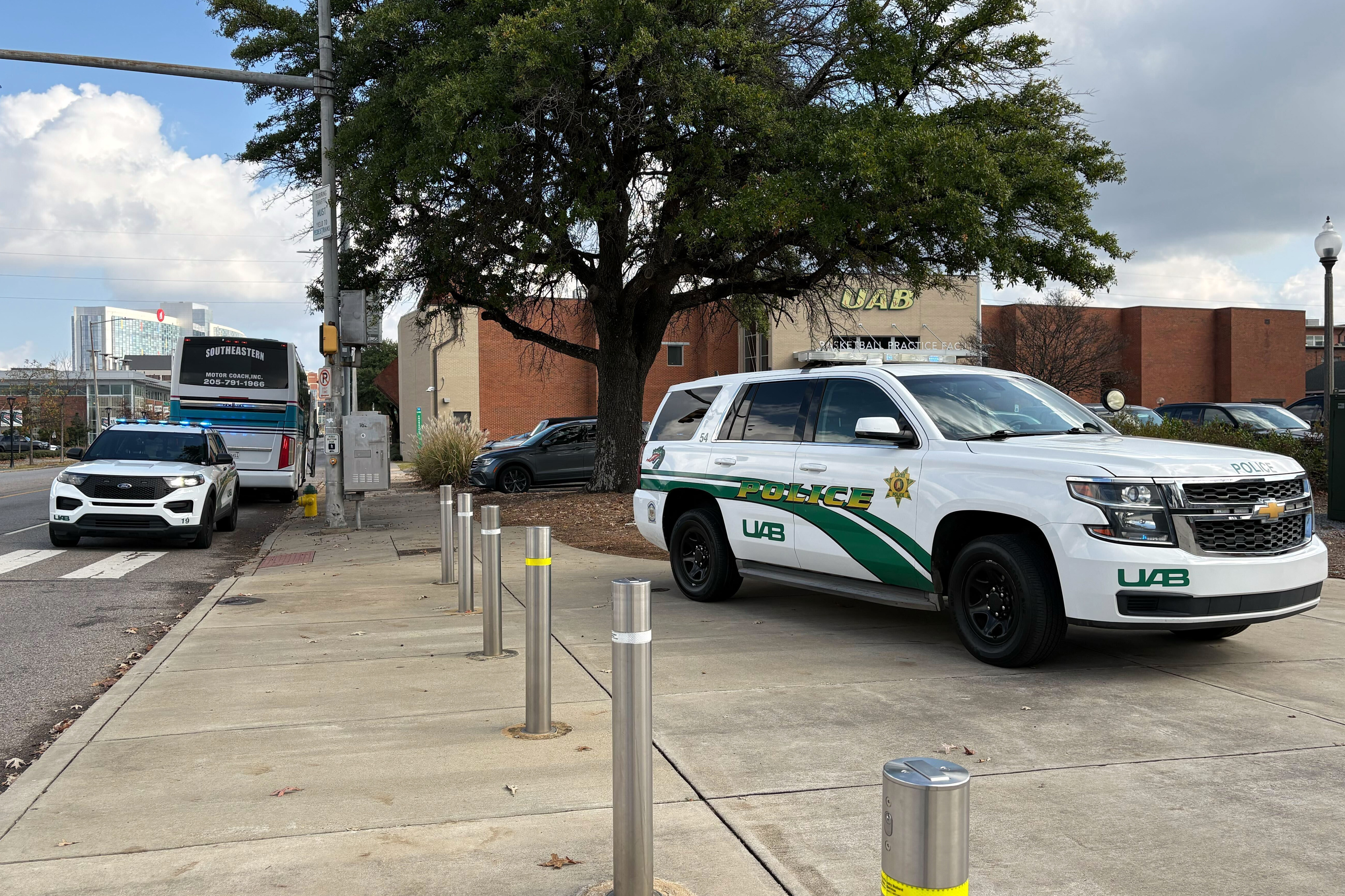 University of Alabama at Birmingham police attend to the scene of a stabbing Saturday, Nov. 22, 2025, at the campus Football Operations Center in Birmingham, Ala. 