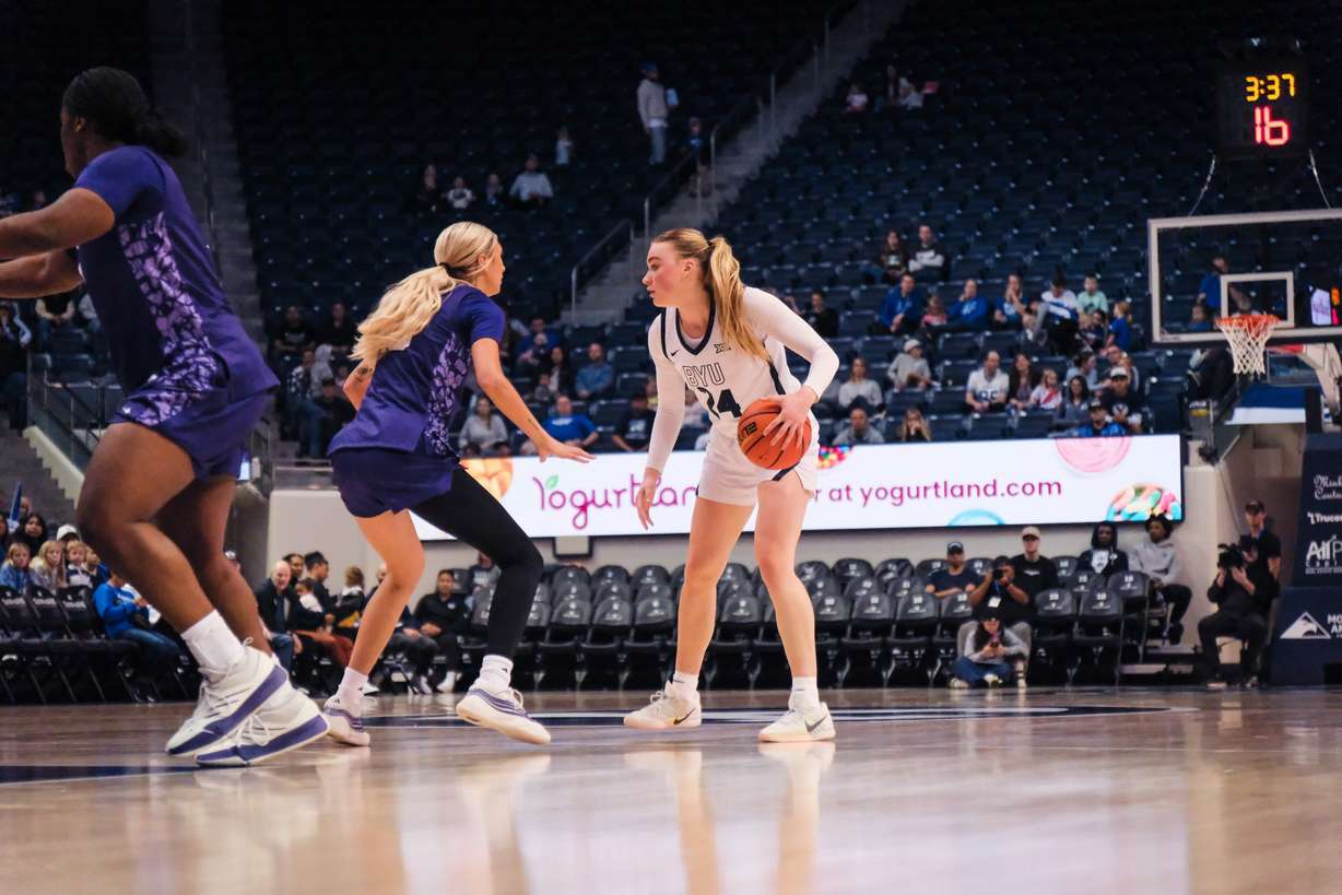 BYU's Brinley Cannon dribbles the ball during a women's college basketball game between BYU and Weber State, Saturday, Nov. 22, 2025 at the Marriott Center in Provo, Utah.