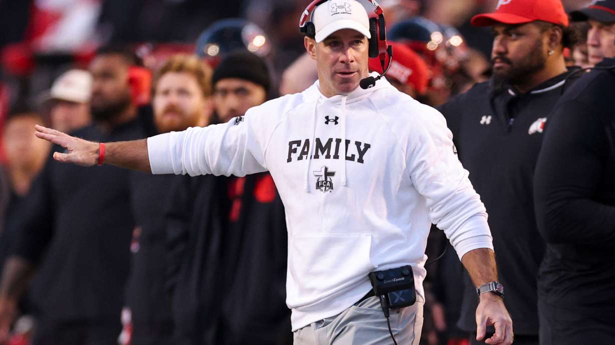 Utah defensive coordinator Morgan Scalley gestures to his players during the second half of an NCAA football game against the Kansas State Wildcats held at Rice-Eccles Stadium in Salt Lake City on Saturday, Nov. 22, 2025.