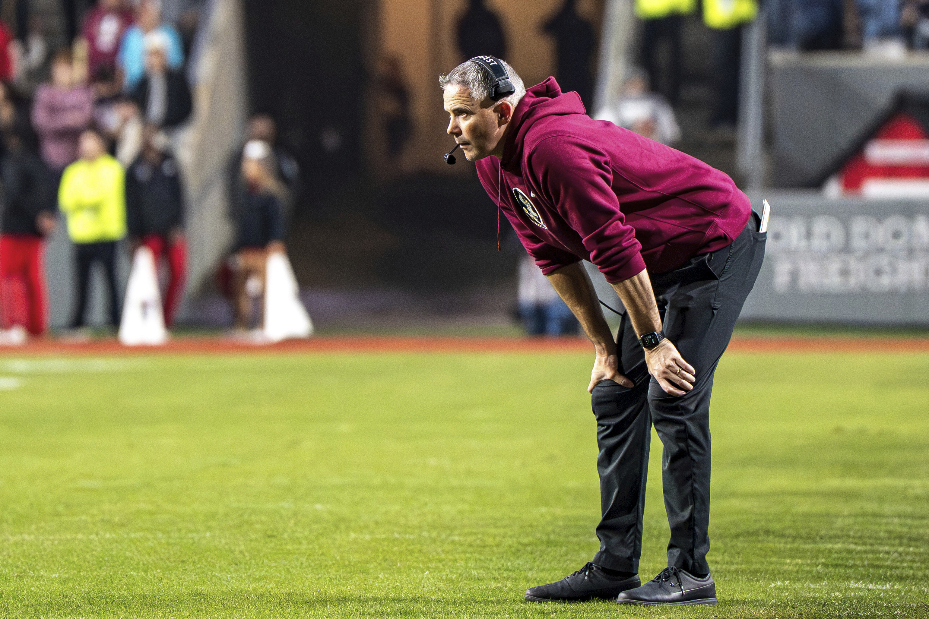 Florida State head coach Mike Norvell stands on the field during the second half of an NCAA college football game against North Carolina State, Friday, Nov. 21, 2025, in Raleigh, N.C. 