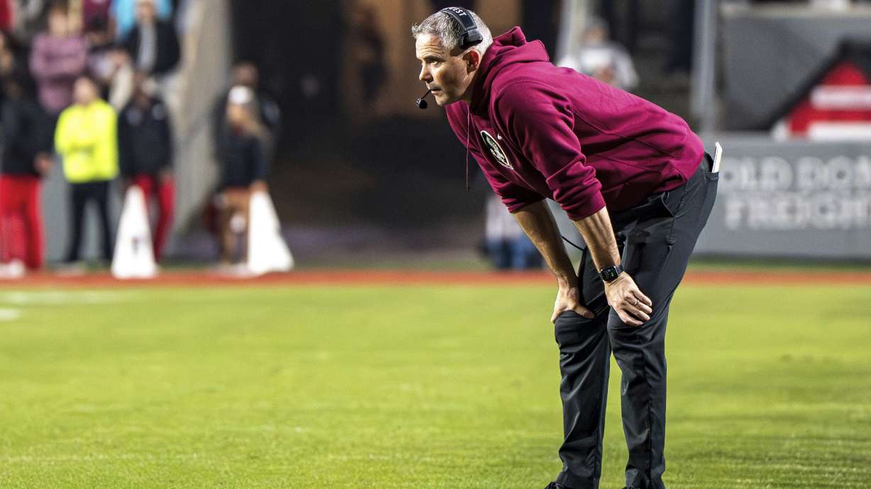 Florida State head coach Mike Norvell stands on the field during the second half of an NCAA college football game against North Carolina State, Friday, Nov. 21, 2025, in Raleigh, N.C.