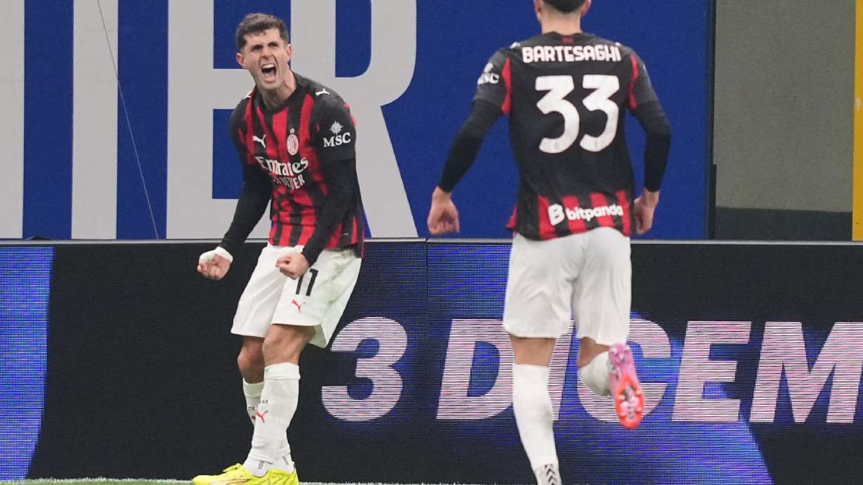 AC Milan's Christian Pulisic celebrates after scoring during the Serie A soccer match between Inter Milan and AC Milan in Milan, Italy, Sunday, Nov. 23, 2025.
