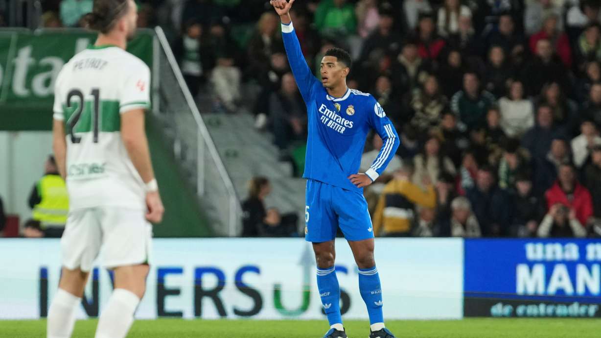 Real Madrid's Jude Bellingham celebrates after scoring his side's second goal during the Spanish La Liga soccer match between Elche and Real Madrid in Elche, Spain, Sunday, Nov. 23, 2025.