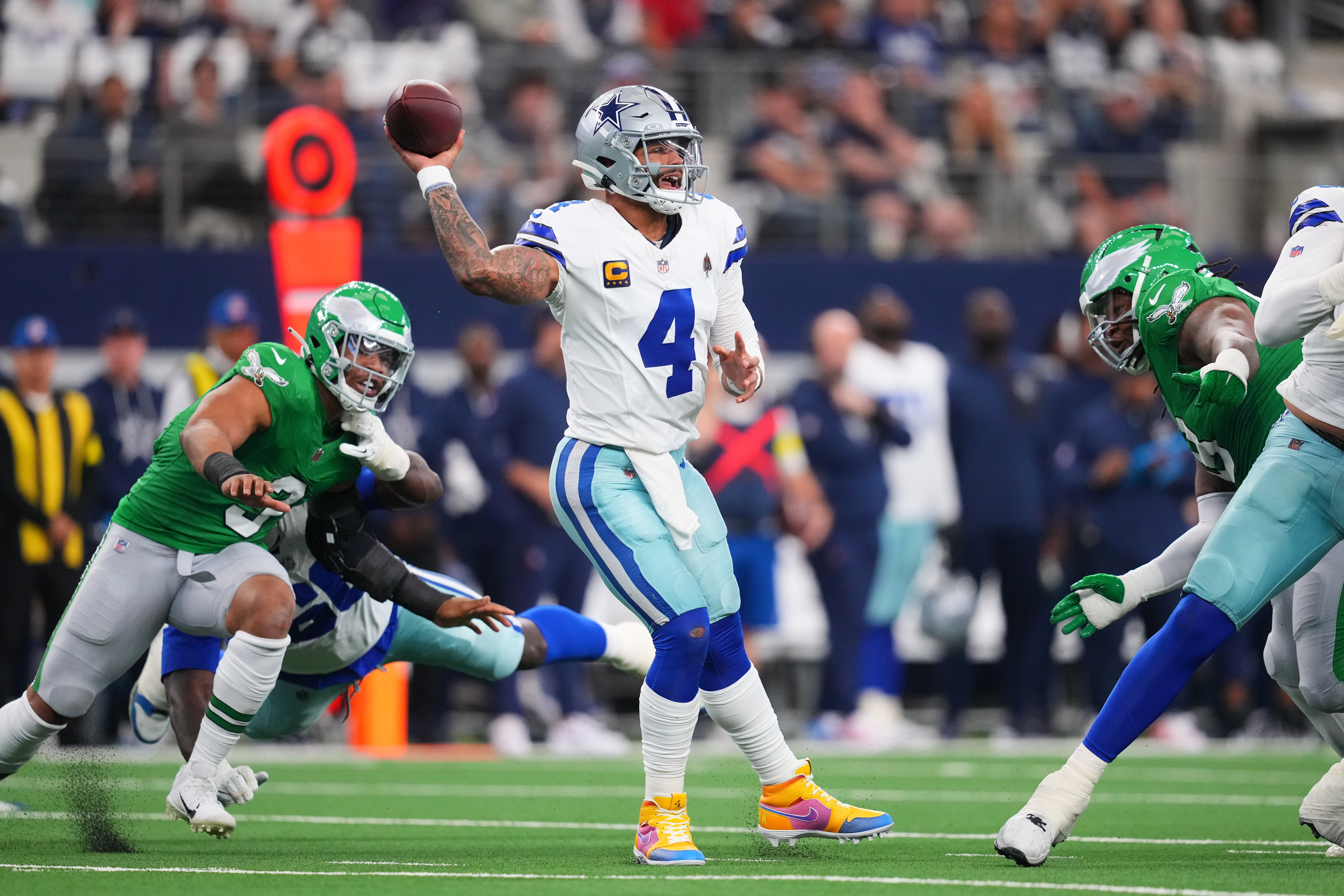 Dallas Cowboys quarterback Dak Prescott (4) throws a pass during the first half of an NFL football game against the Philadelphia Eagles, Sunday, Nov. 23, 2025, in Arlington, Texas. 