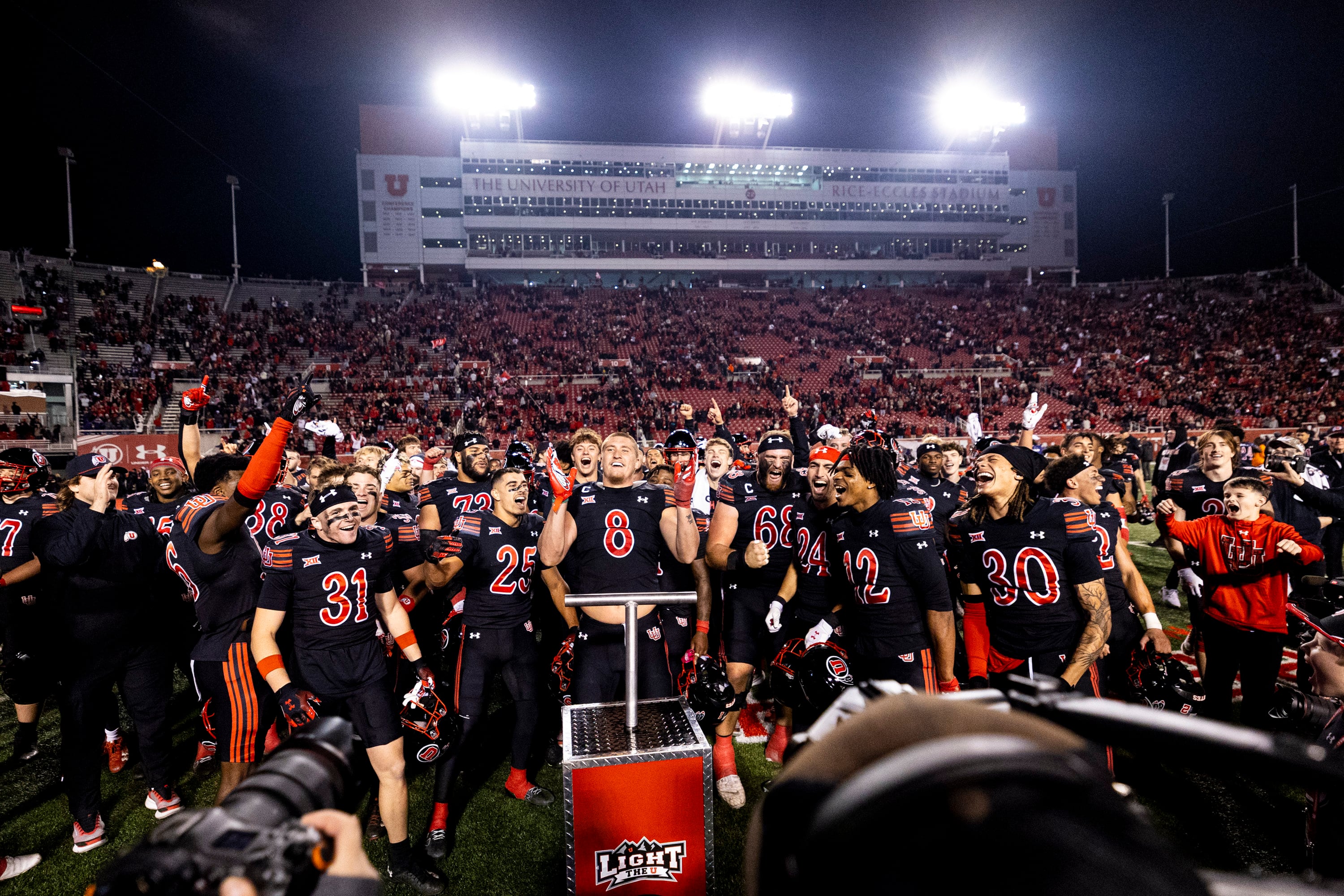 Utah linebacker Lander Barton (8) celebrates after “lighting the U” after Utah defeated Kansas State 51-47 in an NCAA football game held at Rice-Eccles Stadium in Salt Lake City on Saturday.