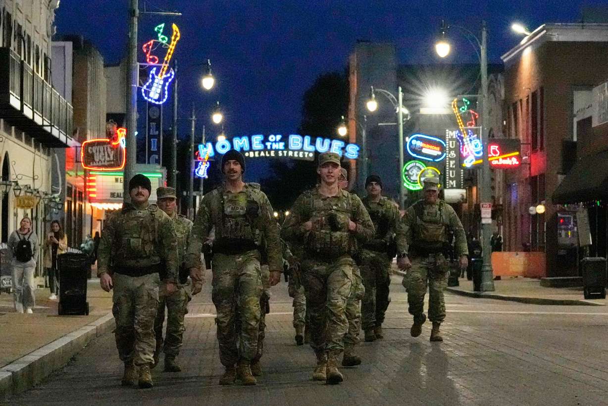 Members of the National Guard conduct a community safety patrol on Beale Street, Oct. 24, in Memphis, Tenn.