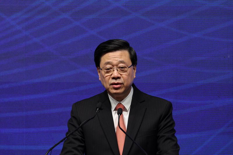 John Lee, chief executive of Hong Kong, delivers a keynote address at the Global Financial Leaders’ Investment Summit, in Hong Kong, China, Nov. 4. Lee said the first priority on Wednesday is to extinguish the fire at Wang Fuk Court and rescue those still there.
