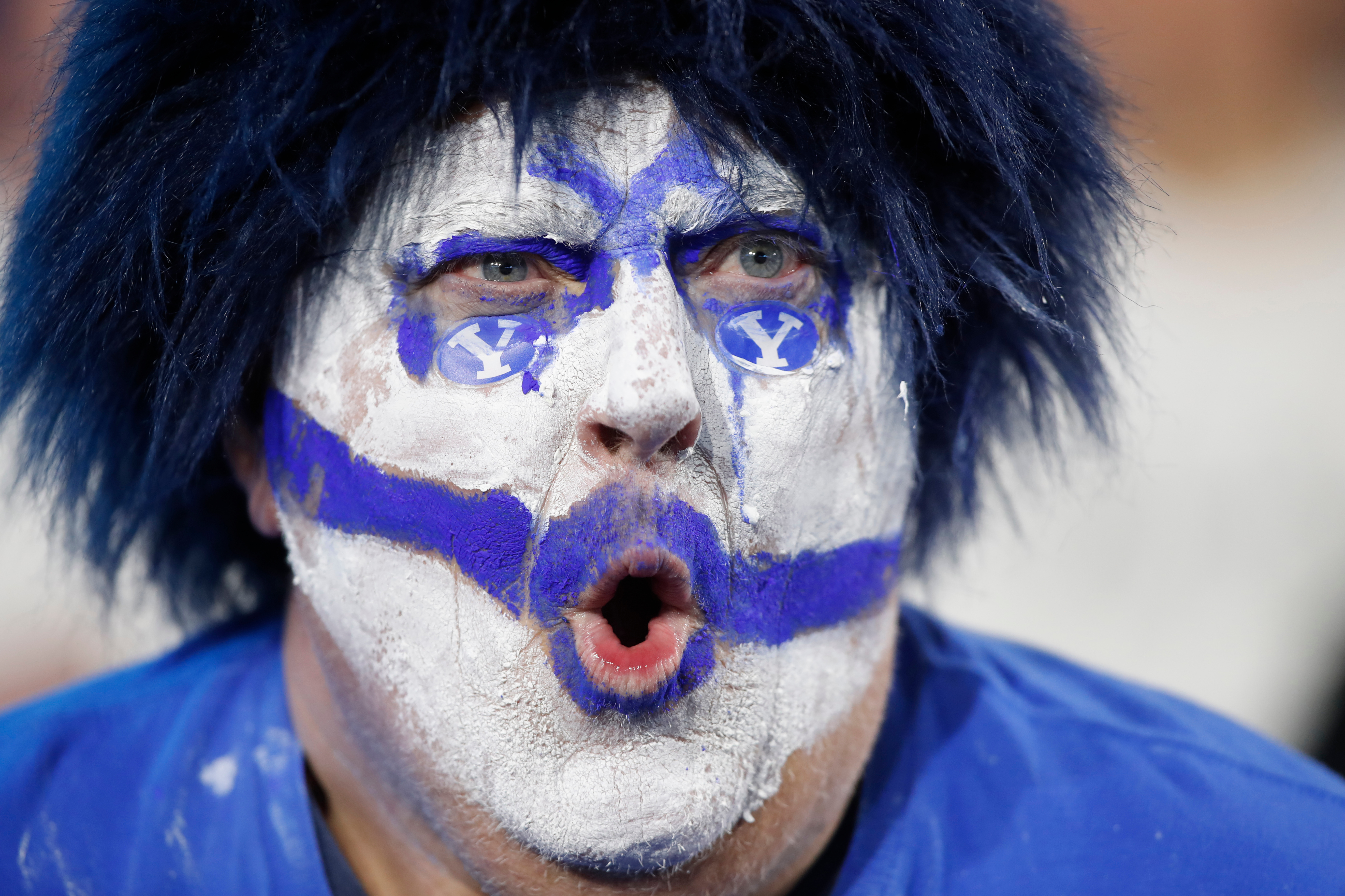 A BYU fan cheers during the second half of an NCAA college football game against TCU Saturday, Nov. 15, 2025, in Provo, Utah. 