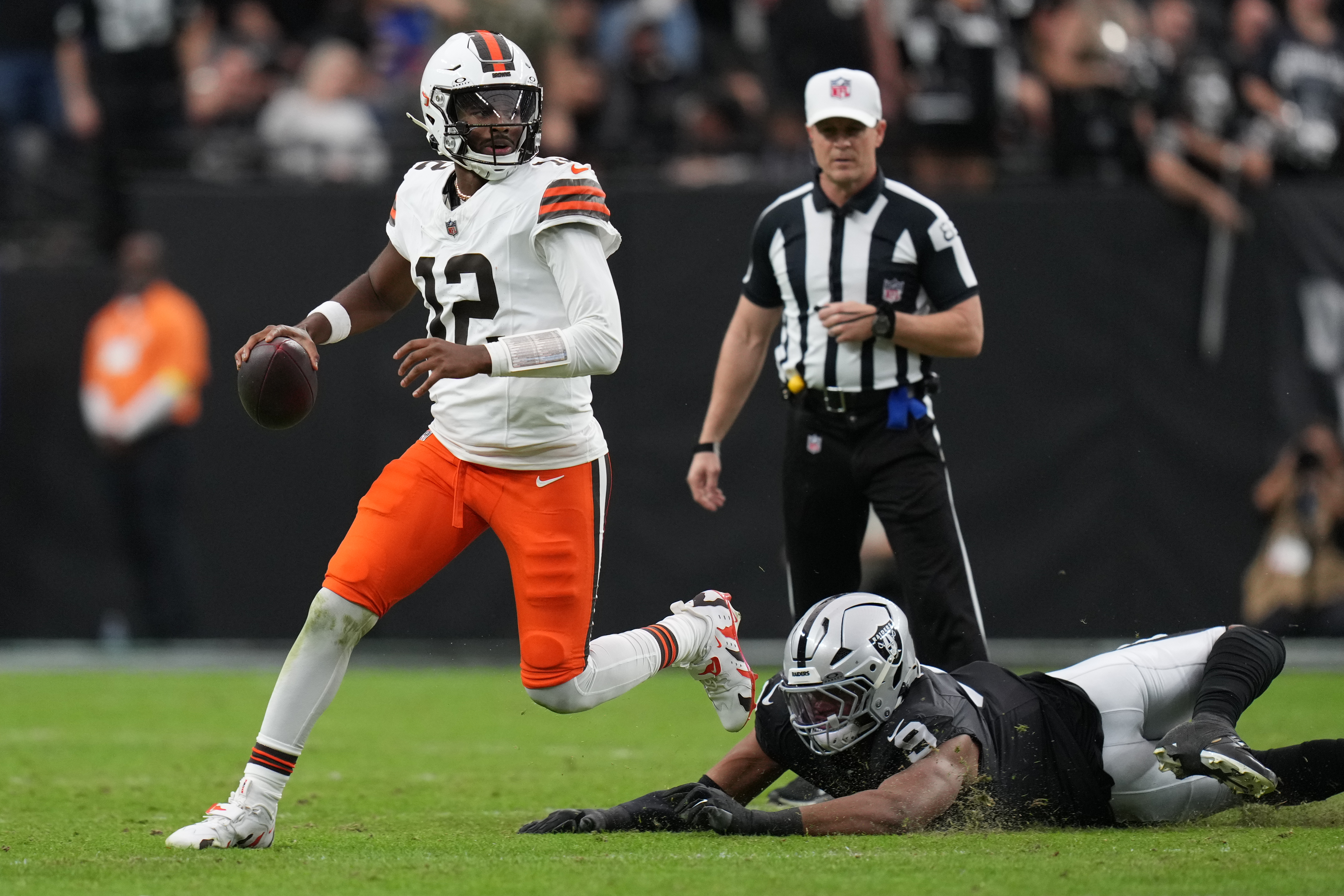 Las Vegas Raiders defensive end Tyree Wilson (9) pressures Cleveland Browns quarterback Shedeur Sanders (12) during the first half of an NFL football game Sunday, Nov. 23, 2025, in Las Vegas.
