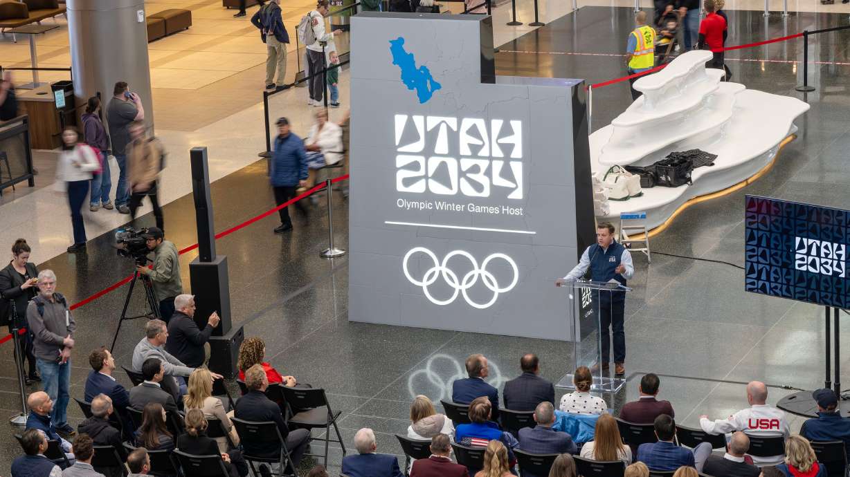 Steve Starks speaks at an event to celebrate 3,000 days until the 2034 Winter Olympics during a ceremony at the Salt Lake City International Airport on Monday. A new transition logo was also unveiled at the event.