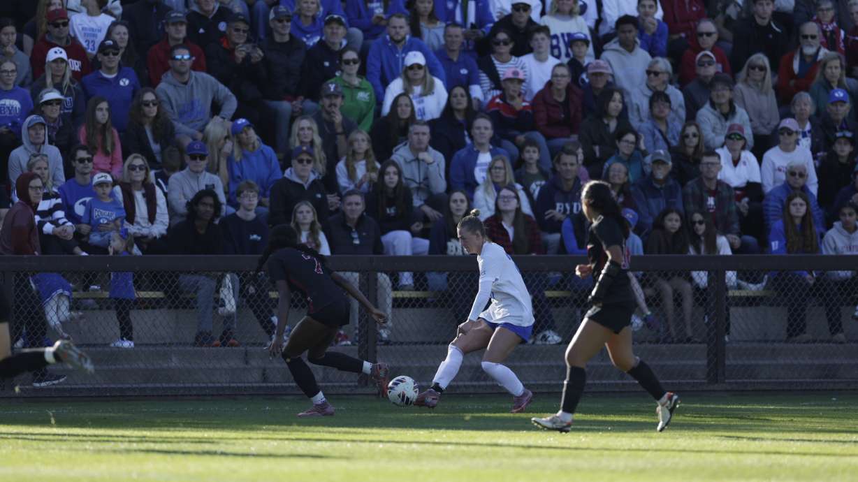 BYU's Presley Freeman moves the back up the field during an NCAA women's soccer tournament match against Stanford, Monday, Nov. 24, 2025 in Stanford, California.