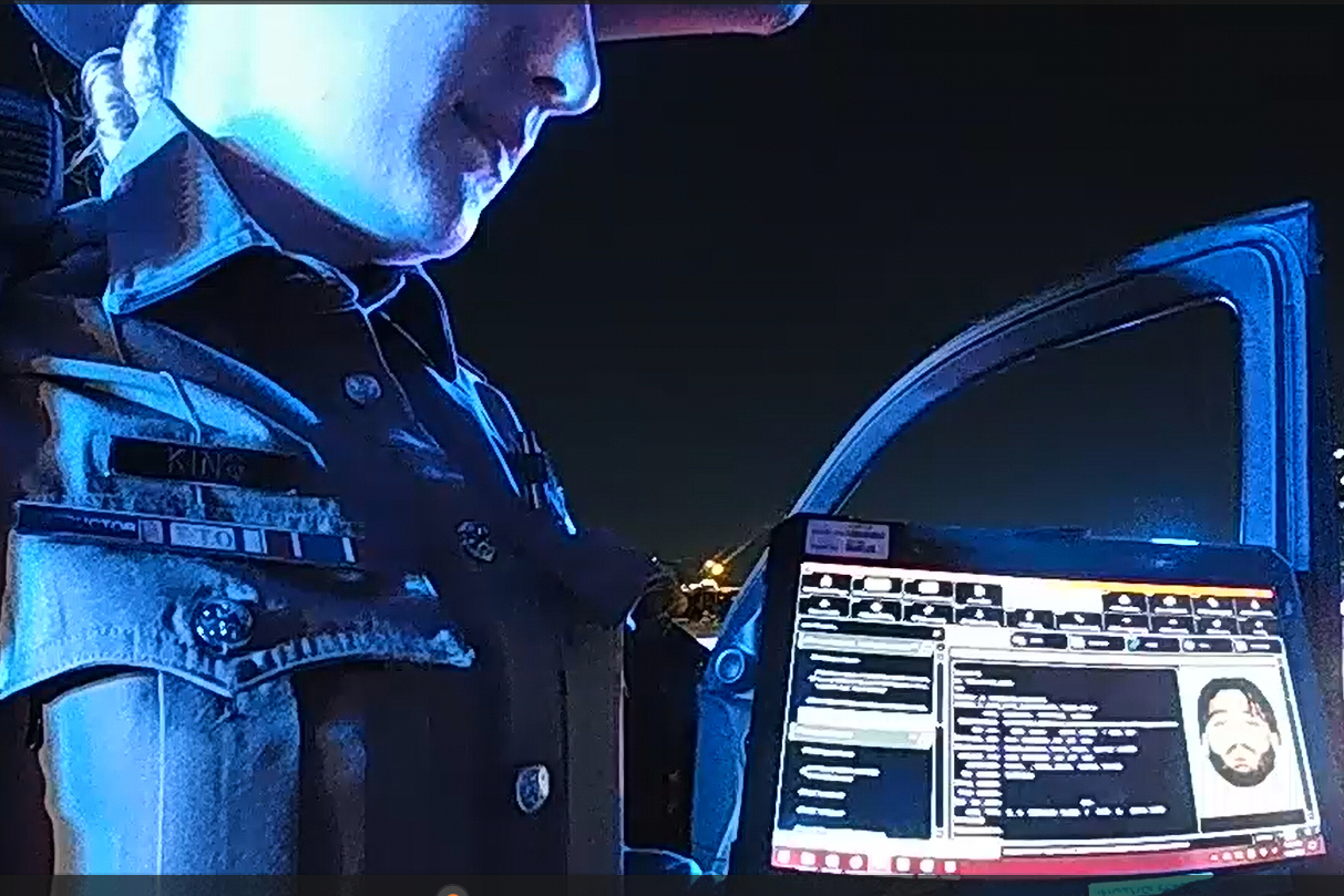 This image taken from video provided by Texas Department of Public Safety shows bodycam footage of law enforcement looking up information about Cowboys defensive end Marshawn Kneeland while searching for him, Nov. 5, 2025, in Frisco, Texas. 