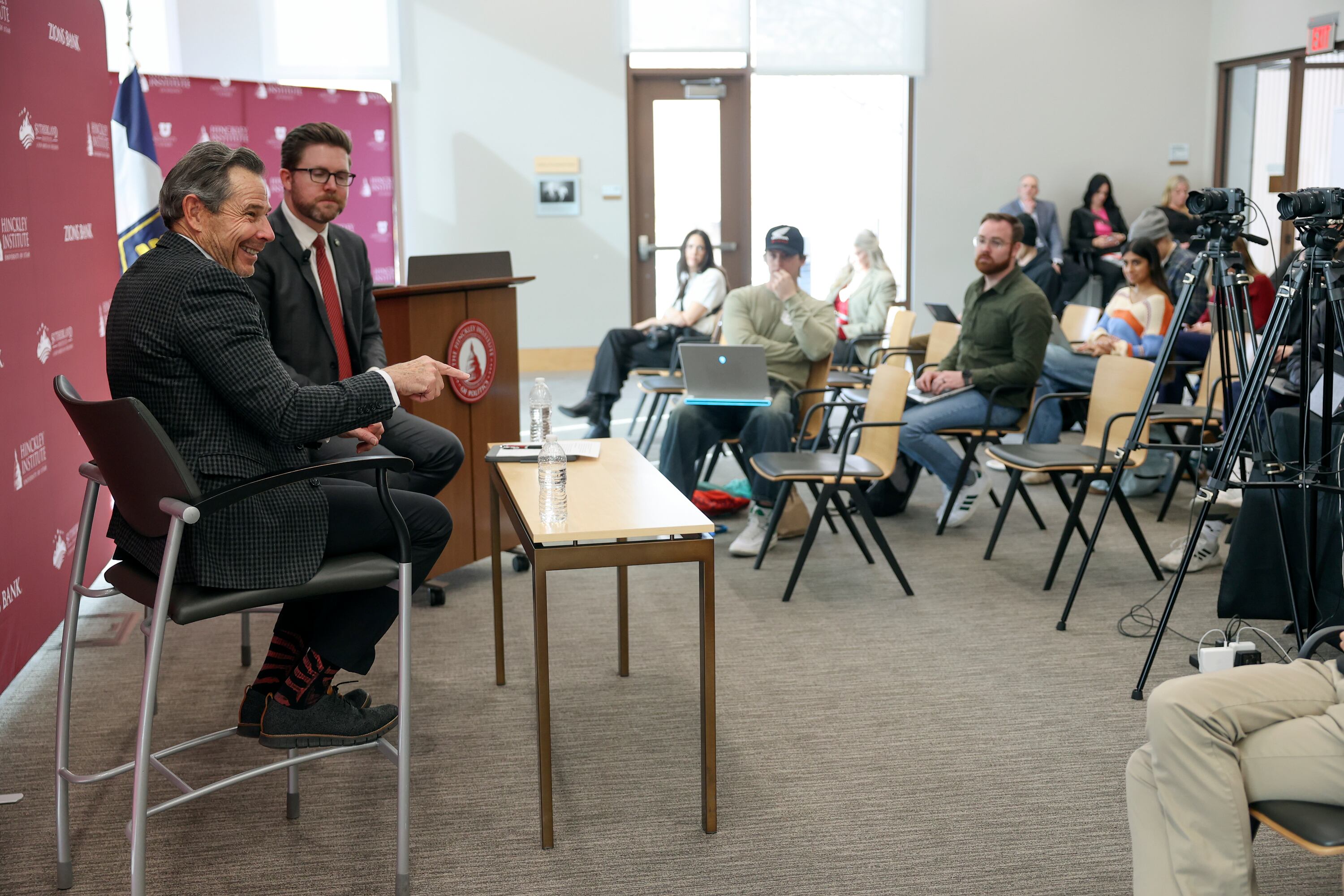Sen. John Curtis, R-Utah, talks with Nic Dunn, Sutherland Institute vice president of strategy and senior fellow, at the Sutherland Institute of Politics Congressional Series at the University of Utah in Salt Lake City on Monday.