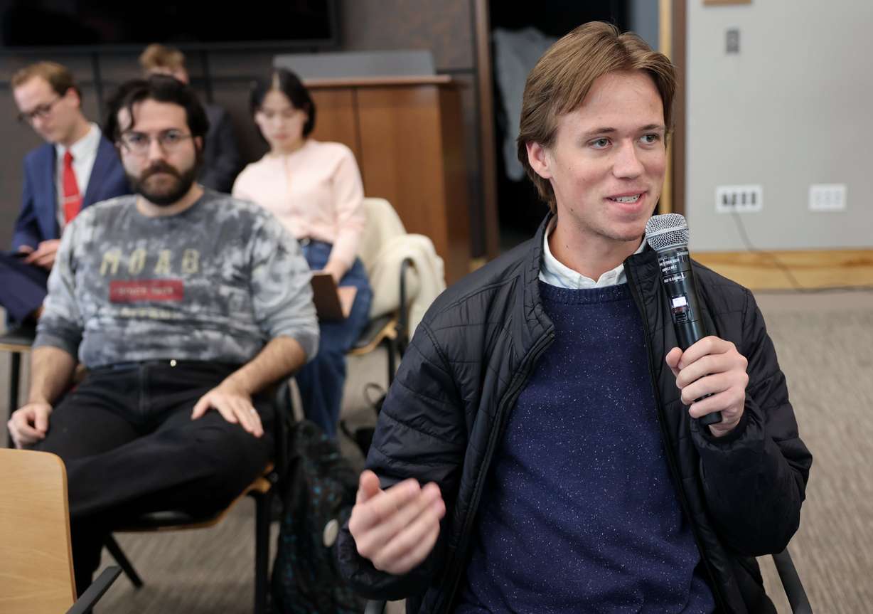 Arden Cook asks Sen. John Curtis, R-Utah, a question as he speaks at the Sutherland Institute of Politics Congressional Series at the University of Utah in Salt Lake City on Monday.