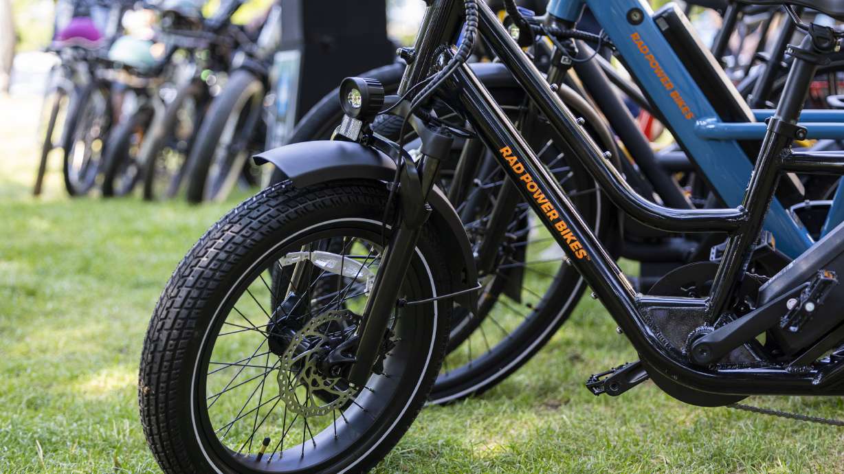 A Rad Power Bikes e-bike is parked at Washington Square Park in Salt Lake City on July 9, 2024. The Consumer Product Safety Commission issued a safety warning on Monday over a pair of battery models used on several e-bike models.