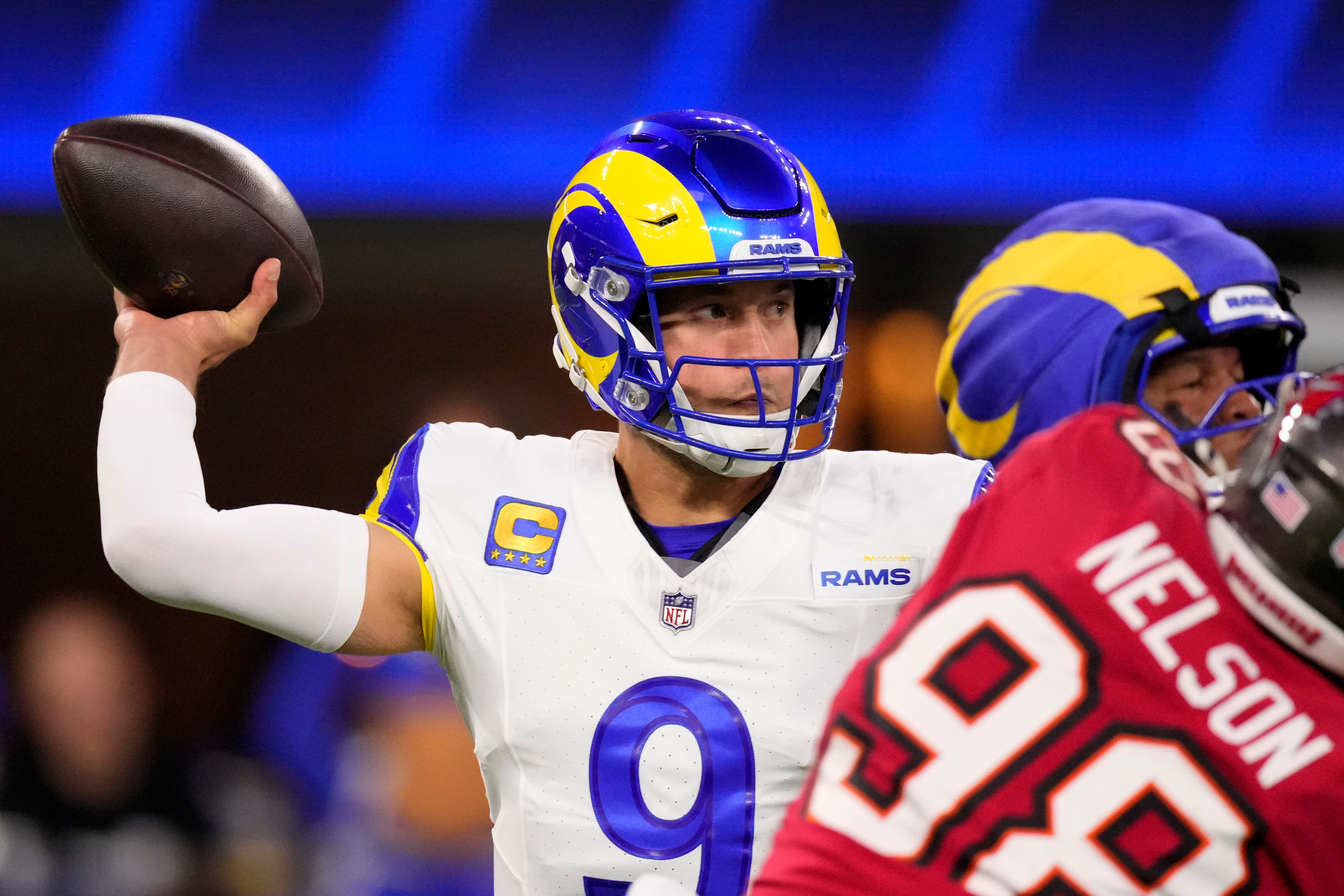 Los Angeles Rams quarterback Matthew Stafford (9) passes against the Tampa Bay Buccaneers during the first half of an NFL football game, Sunday, Nov. 23, 2025, in Inglewood, Calif. 