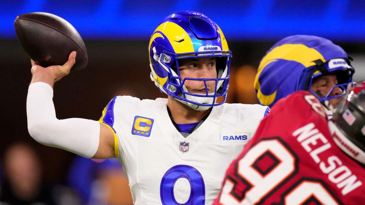 Los Angeles Rams quarterback Matthew Stafford (9) passes against the Tampa Bay Buccaneers during the first half of an NFL football game, Sunday, Nov. 23, 2025, in Inglewood, Calif.