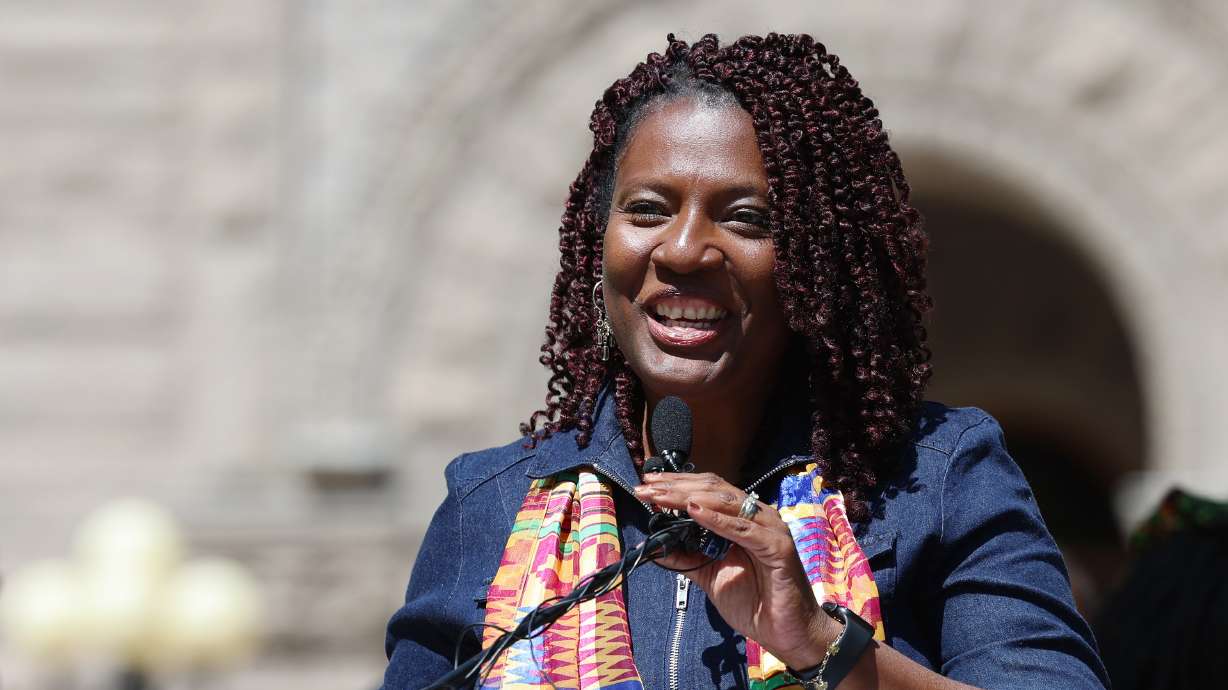 Rep. Sandra Hollins, D-Salt Lake City, speaks as she helps raise the Juneteenth flag at the Salt Lake City-County Building on June 14, 2022. Hollins, the first Black woman to serve in the Utah Legislature, said she will not seek reelection next year.
