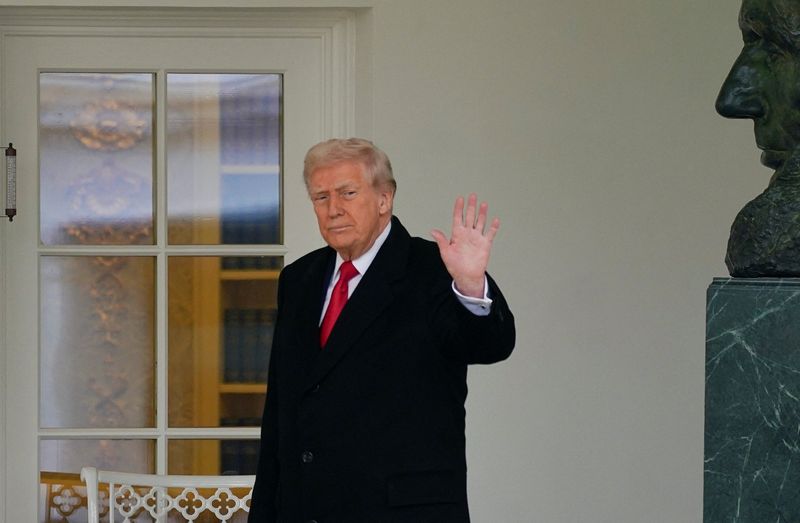 President Donald Trump waves during the annual Thanksgiving turkey pardoning ceremony in the Rose Garden at the White House in Washington, Tuesday. Trump said he looked forward to meeting with both President Volodymyr Zelenskyy and Vladimir Putin separately soon.
