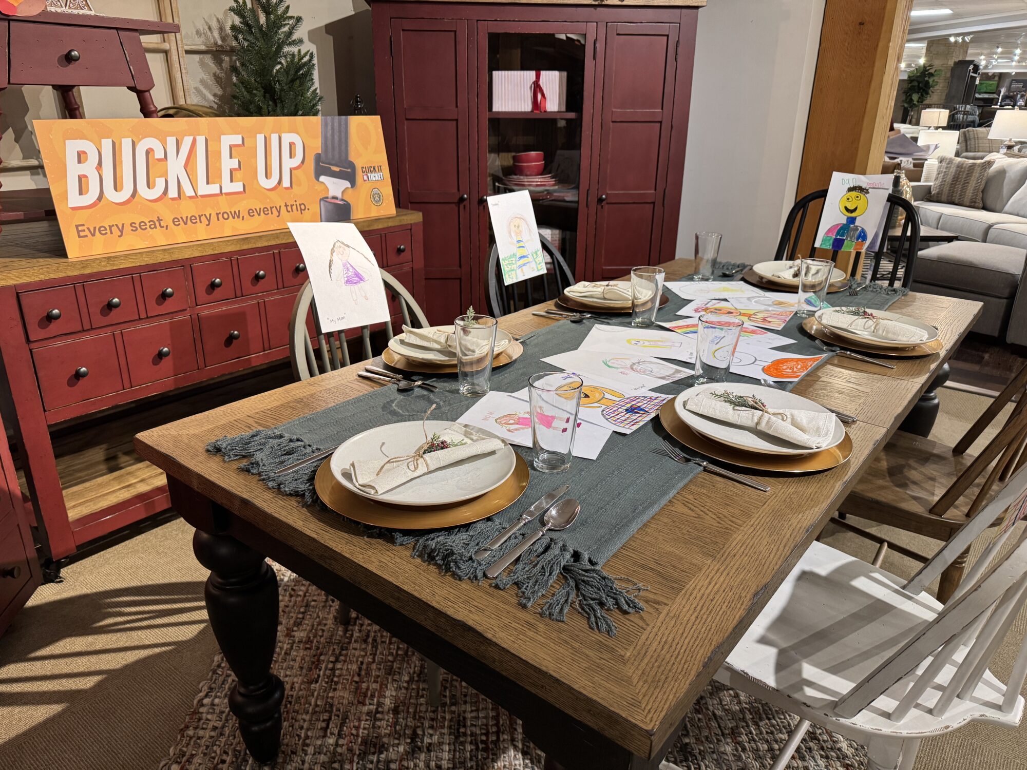 A display promoting seat belt usage with children's drawings by the Utah Department of Public Safety, Tuesday. The Utah Department of Public Safety is using these displays as part an enforcement campaign that runs from Wednesday until Dec. 1.