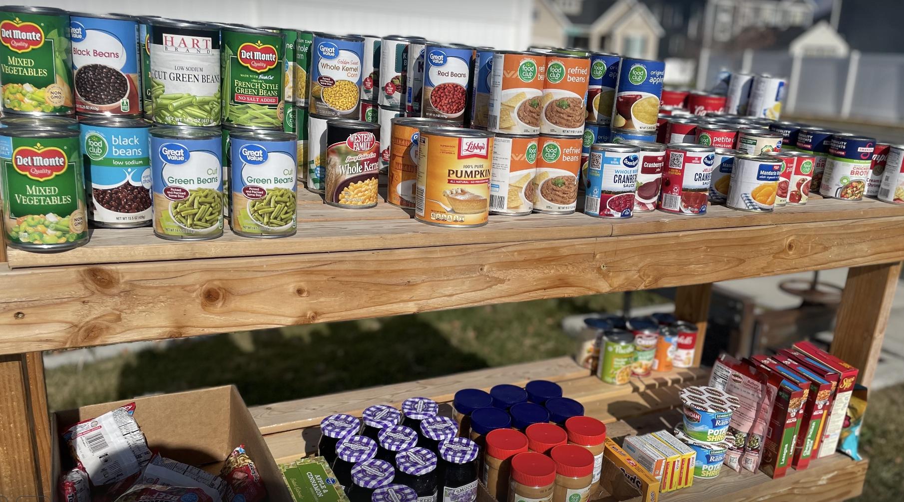 Nonperishable food items sit on a mini food bank aimed to serve a local Lehi neighborhood on Nov. 22.