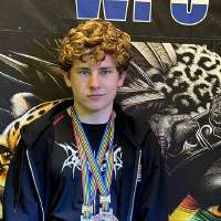 Idaho teen competes for USA powerlifting team at the world championship, sets world record