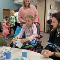 Utah Mammoth players bring holiday cheer to kids at Intermountain Primary Children's Hospital