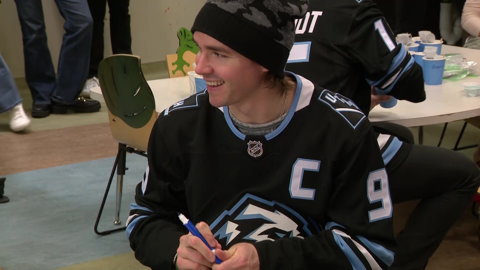 Utah Mammoth team member Clayton Keller is pictured visiting Intermountain Primary Children’s Hospital on Tuesday. Keller, who serves as the team captain, said giving back is part of the team's mission.