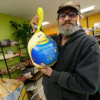 Who is to blame for cheaper Thanksgiving dinner yet rising costs of living?