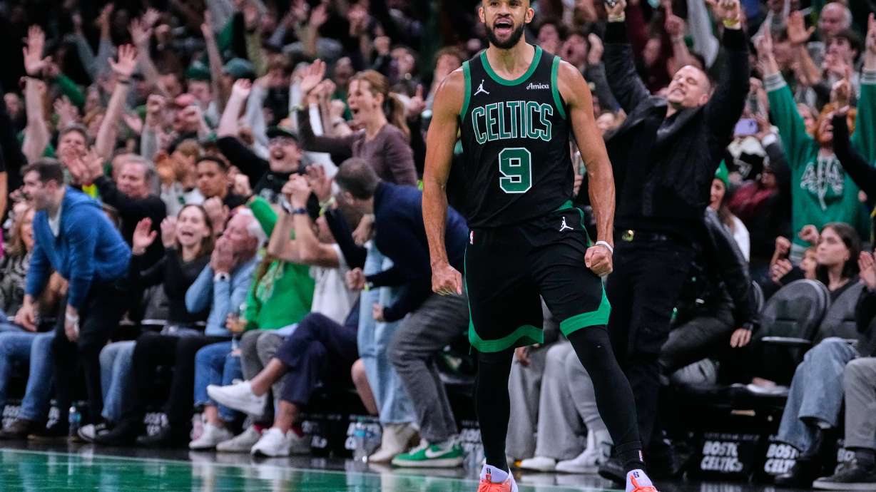 Boston Celtics guard Derrick White (9) celebrates after hitting a there-pointer late in the second half of an Emirates NBA Cup basketball game against the Detroit Pistons, Wednesday, Nov. 26, 2025, in Boston.