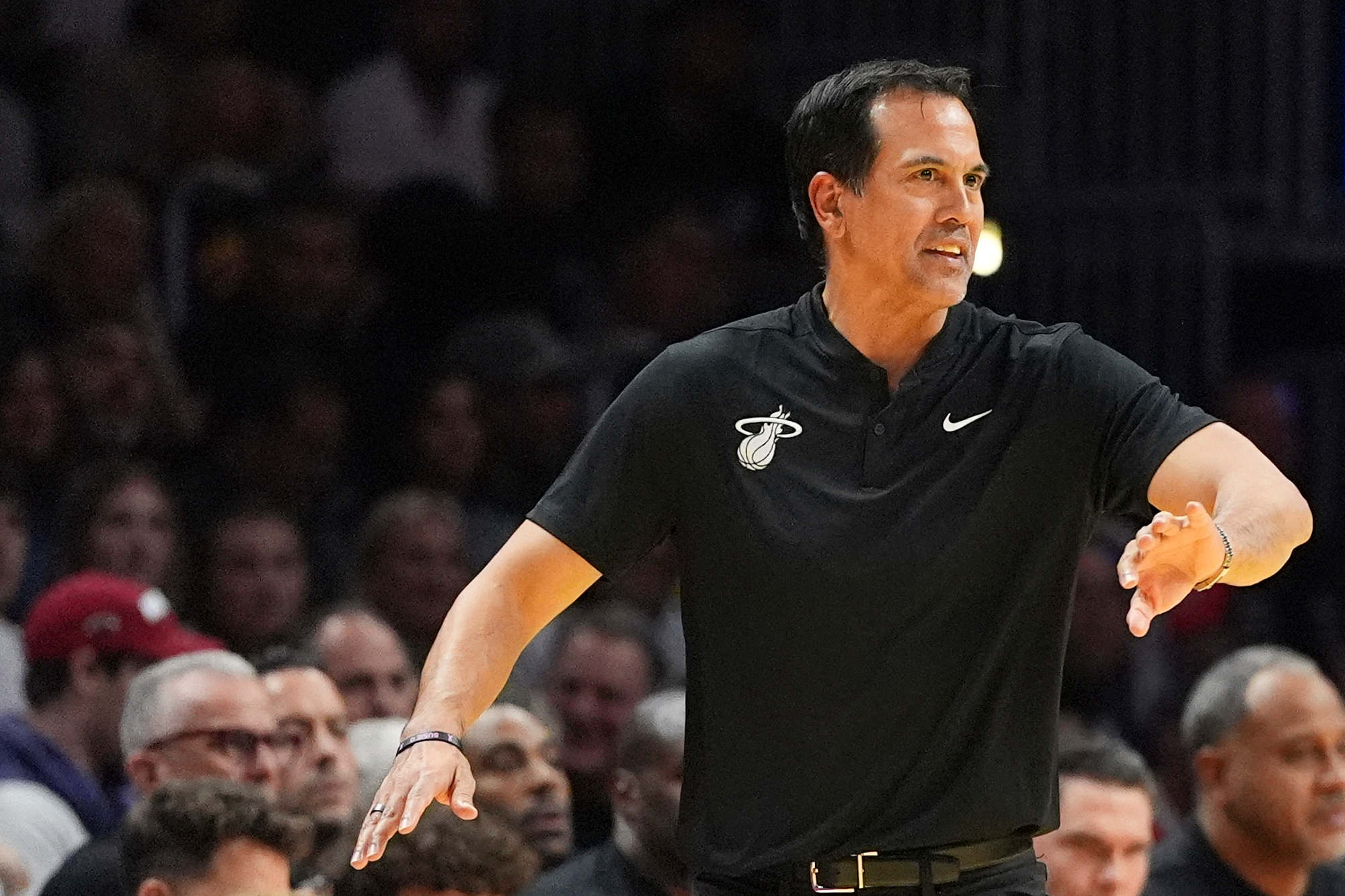Miami Heat head coach Erik Spoelstra directs his players during the second half of an Emirates NBA Cup basketball game against the Milwaukee Bucks, Wednesday, Nov. 26, 2025, in Miami. 