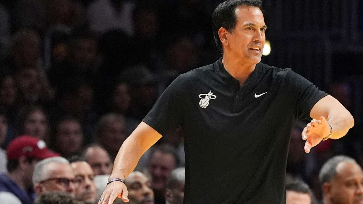 Miami Heat head coach Erik Spoelstra directs his players during the second half of an Emirates NBA Cup basketball game against the Milwaukee Bucks, Wednesday, Nov. 26, 2025, in Miami.