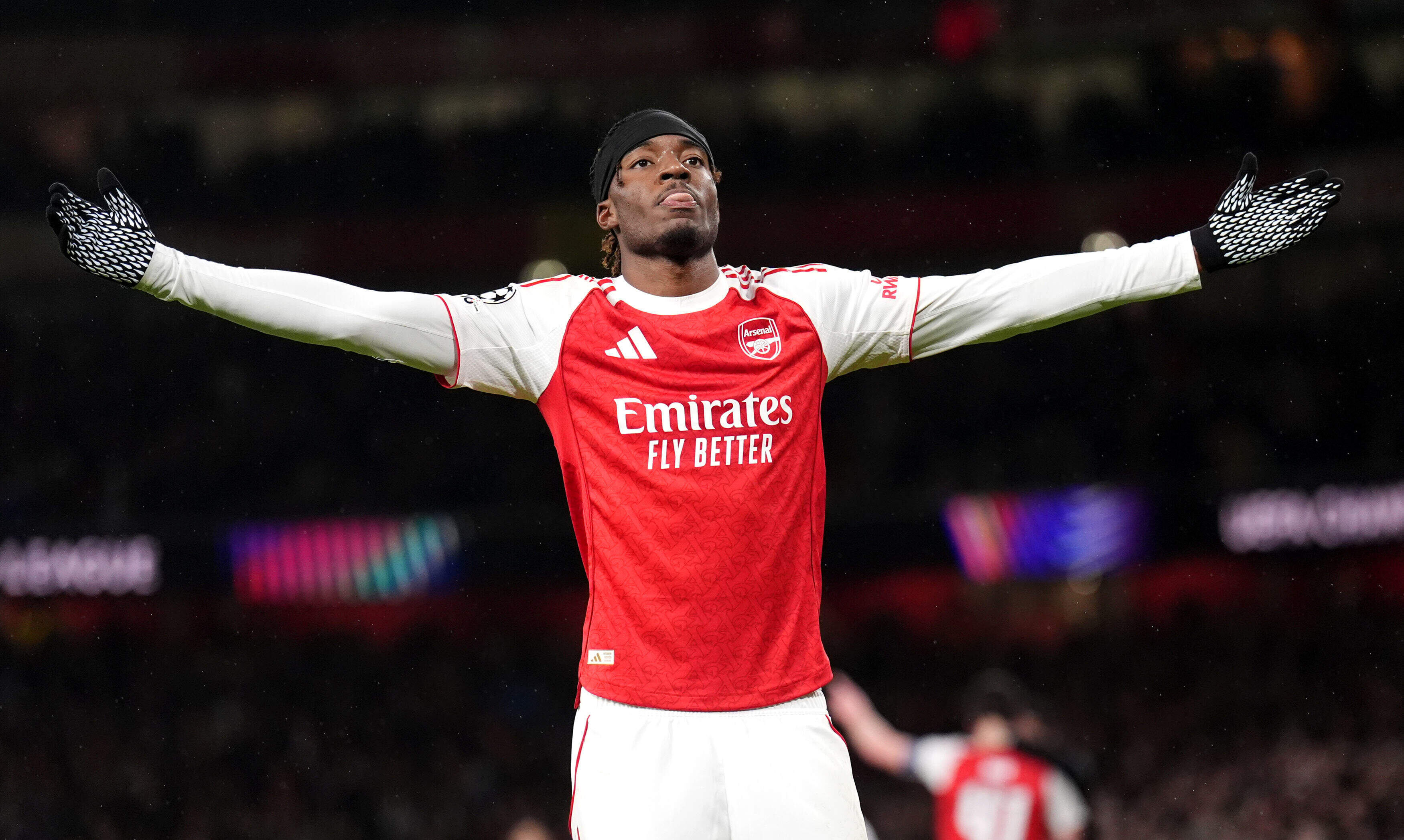 Arsenal's Noni Madueke celebrates after scoring his side's second goal during the Champions League opening phase soccer match between Arsenal and Bayern Munich in London, Wednesday, Nov. 26, 2025. 
