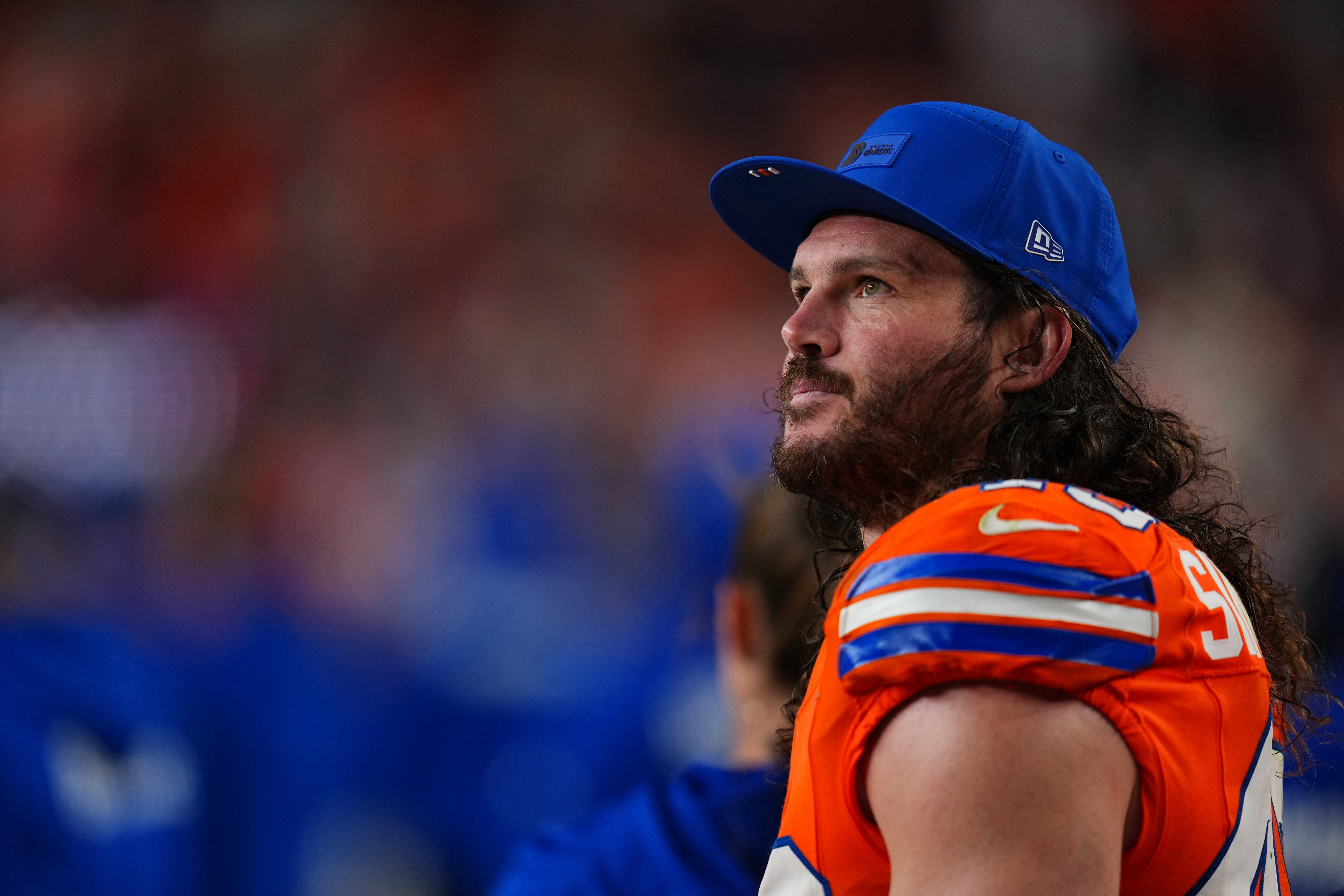 FILE - Denver Broncos inside linebacker Alex Singleton watches from the sidelines during the second half of an NFL football game against the Las Vegas Raiders Thursday, Nov. 6, 2025, in Denver. 