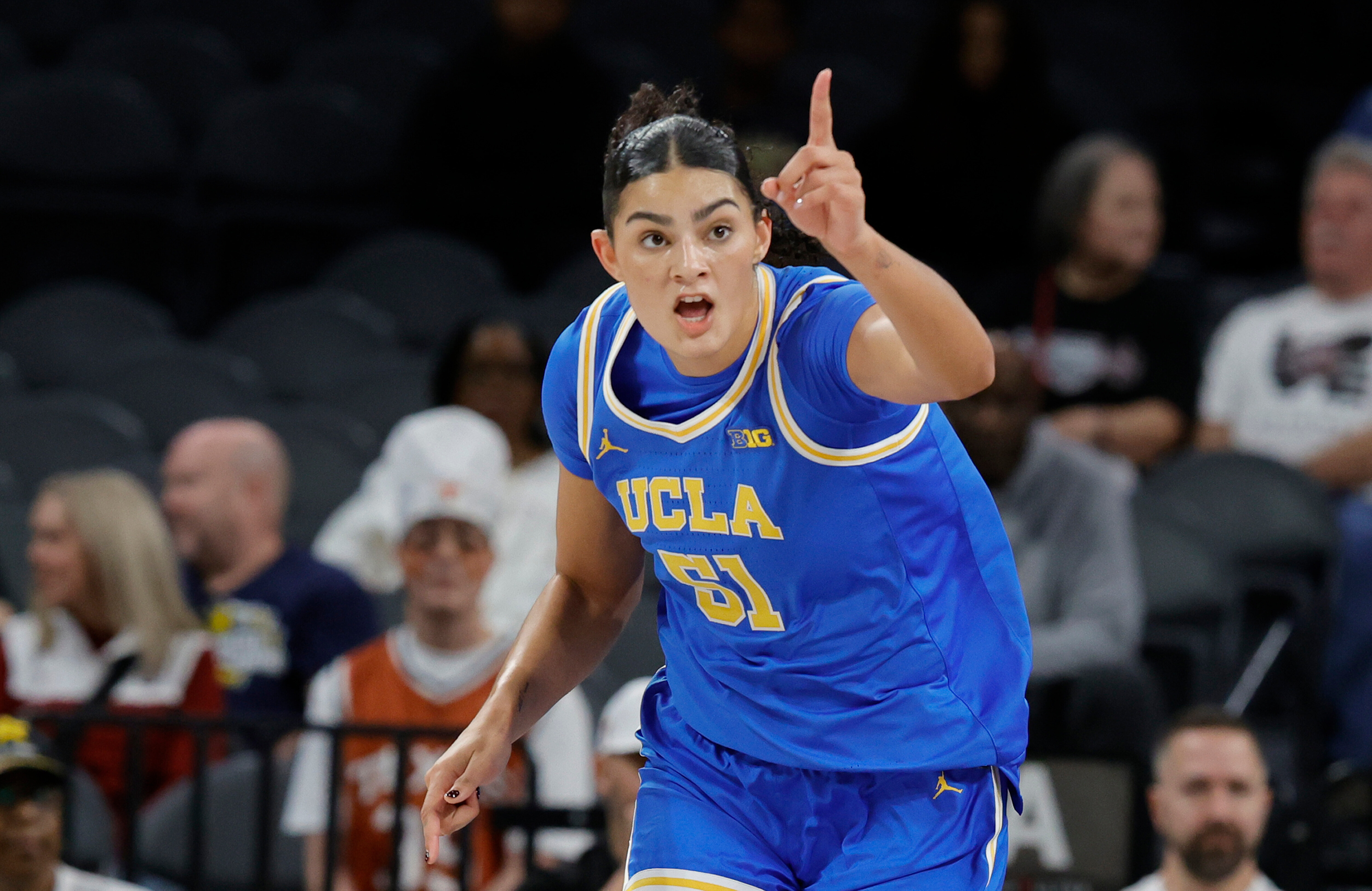 UCLA center Lauren Betts (51) reacts after making a basket against Texas during the first half of an NCAA college basketball game in the Players Era tournament Wednesday, Nov. 26, 2025, in Las Vegas. 