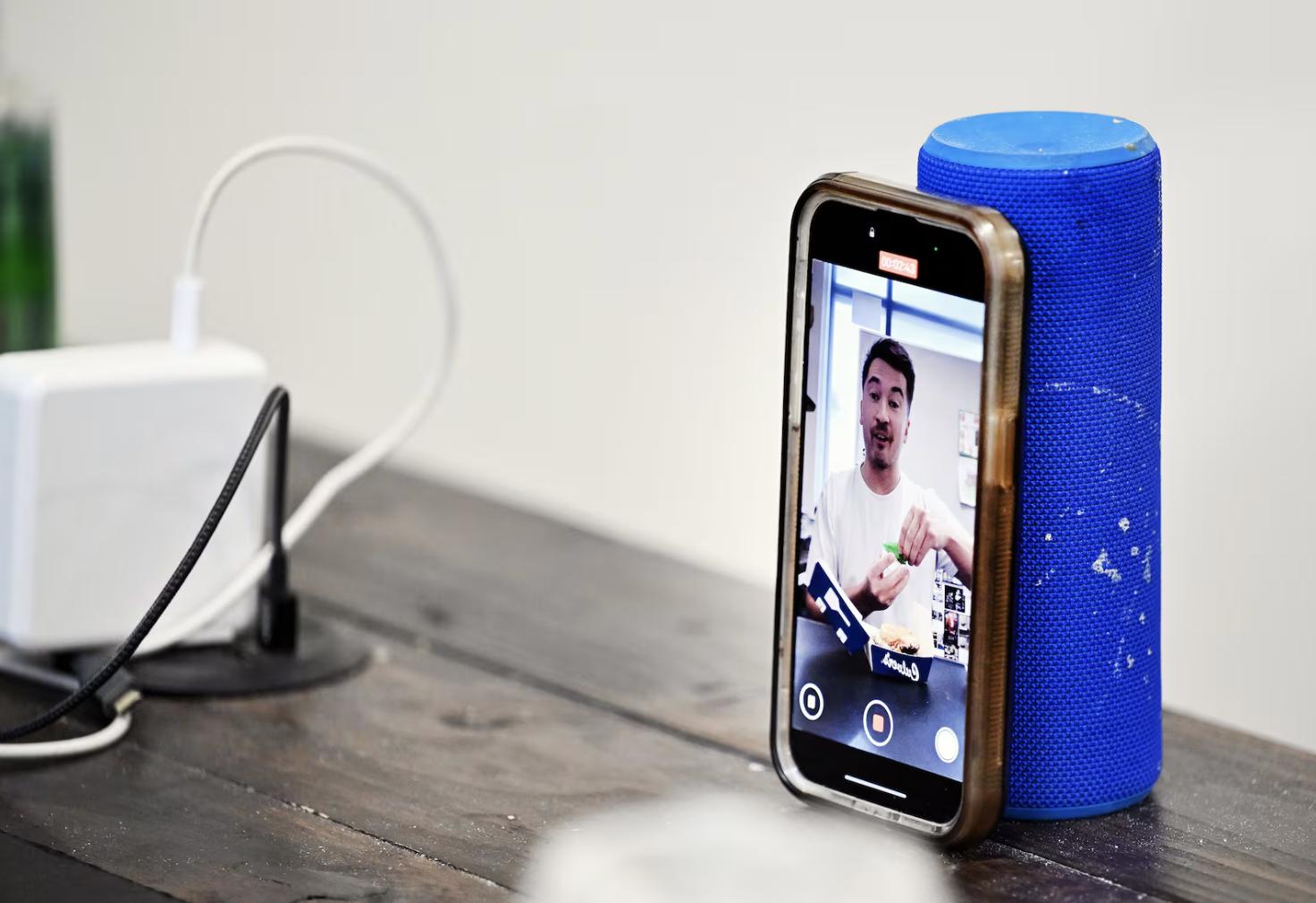 Lehi High School social studies teacher Joey Hall records a video while on a lunch break at school in Lehi on Nov. 18. Hall has amassed 2.2 million followers on TikTok doing food reviews.