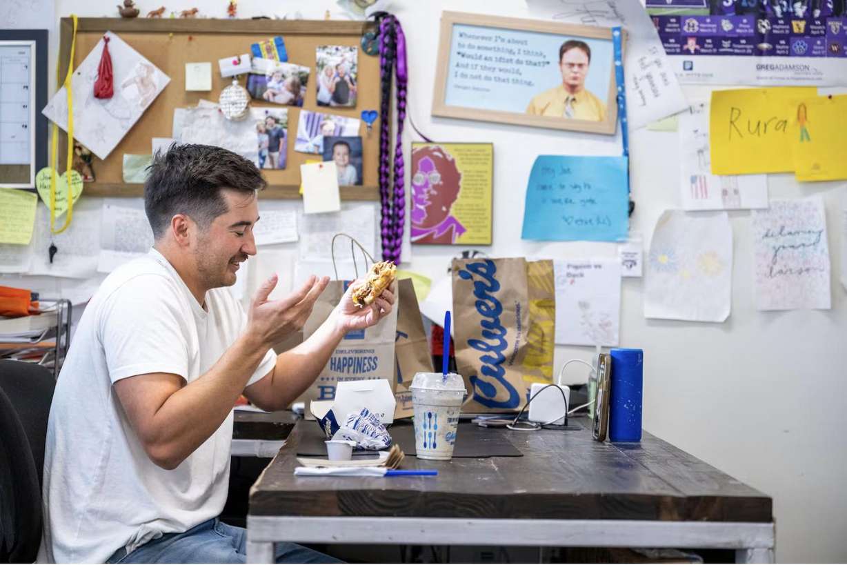 Lehi High School social studies teacher Joey Hall records a video while on a lunch break at school in Lehi on Nov. 18. Hall has amassed 2.2 million followers on TikTok doing food reviews.