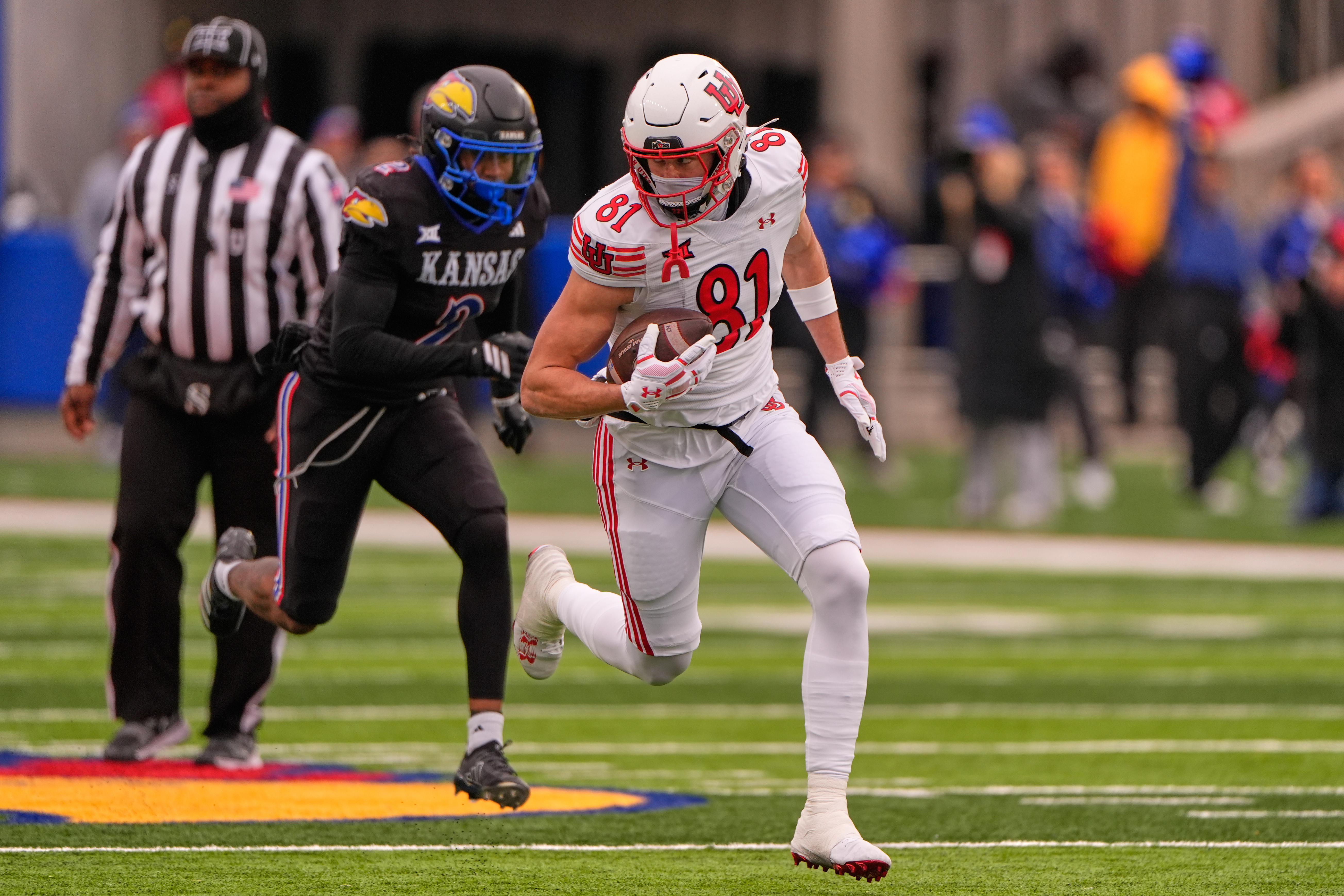 No. 13 Utah erases another slow start to pull away from Kansas