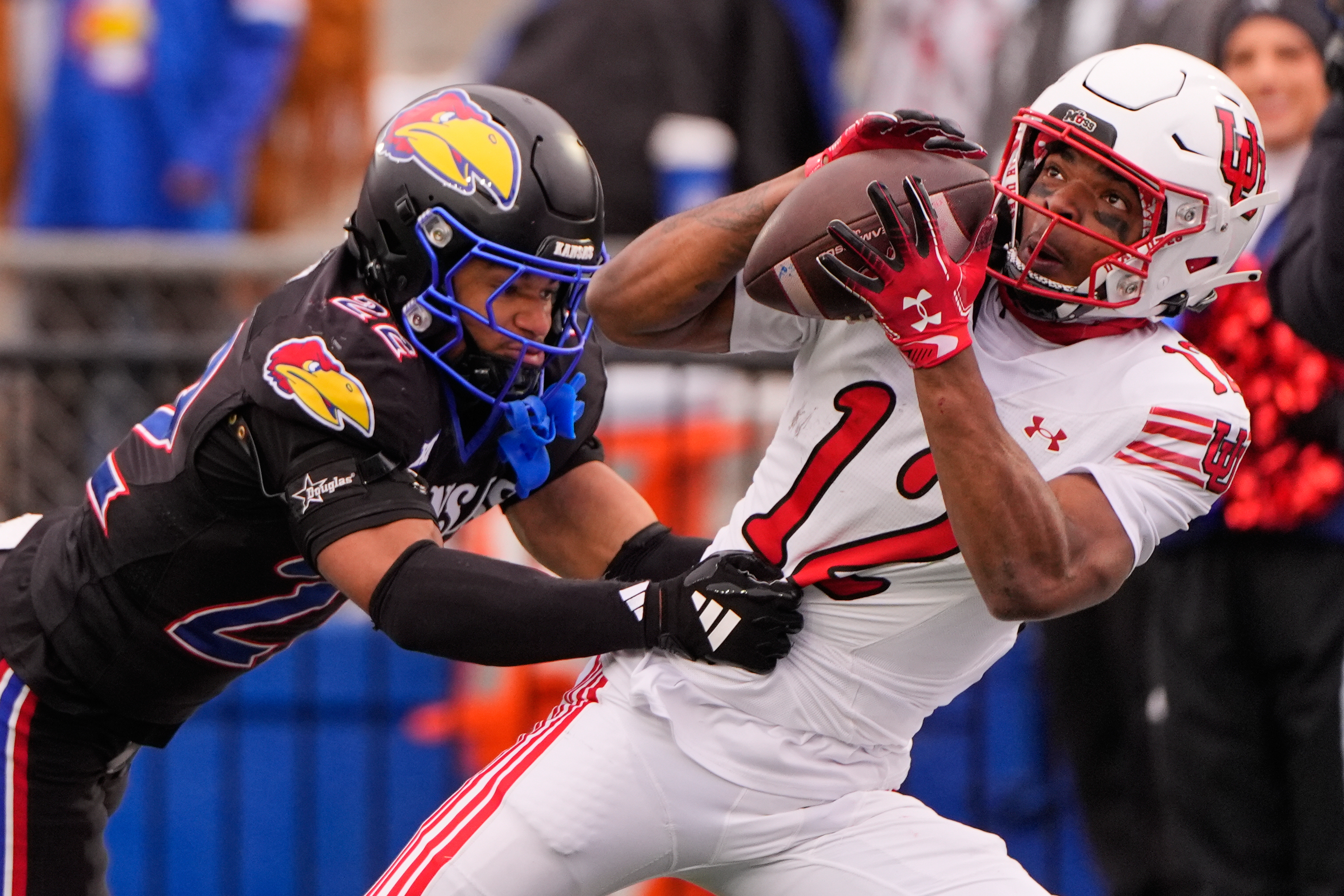 Kansas' Jalon Daniels throws 3 picks as No. 13 Utah pulls away for 10-win season