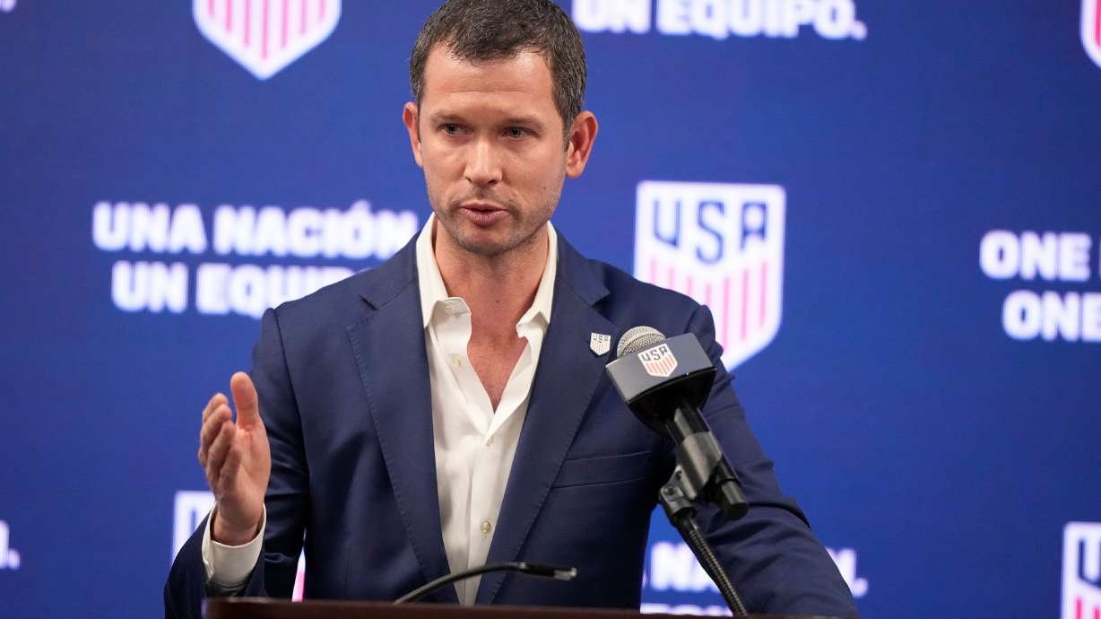 FILE - JT Batson, CEO of U.S. Soccer, speaks during a news conference, Sept. 16, 2023, in Atlanta.