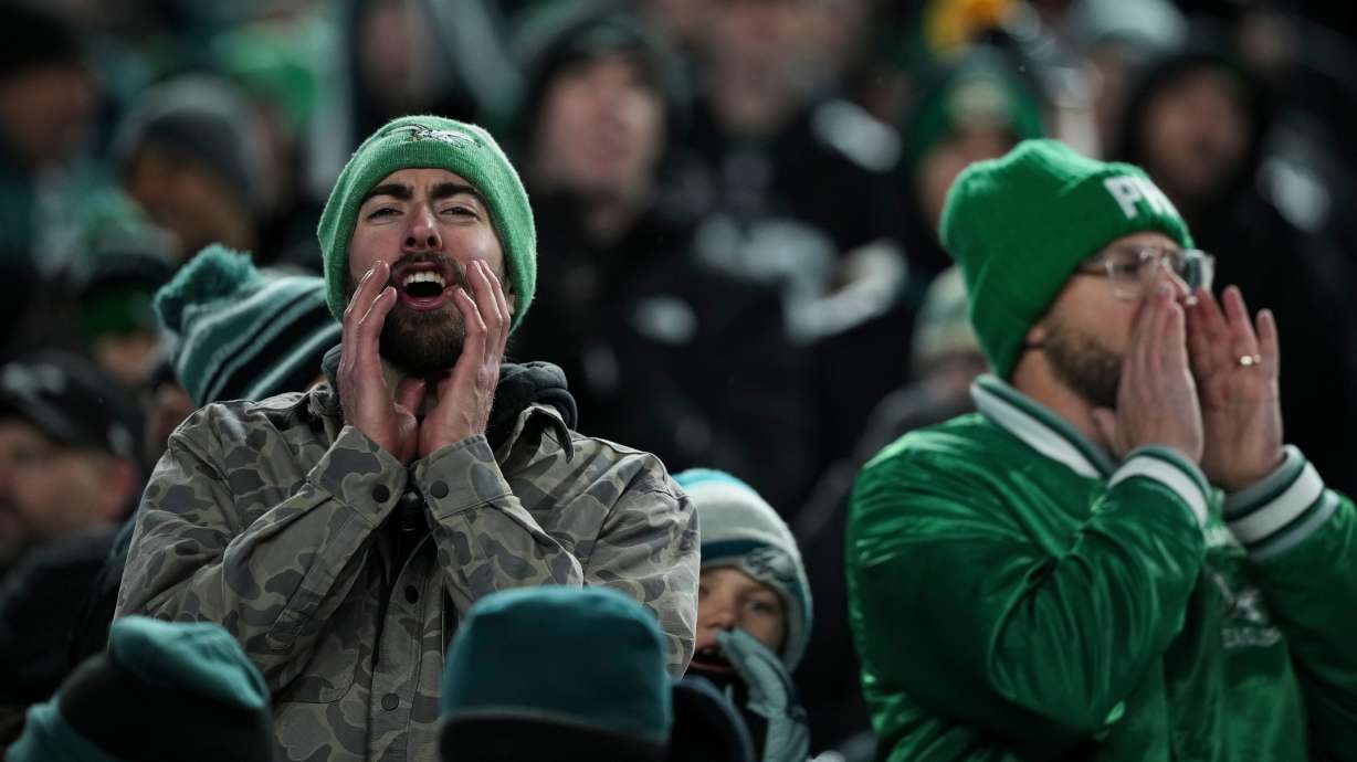 Philadelphia Eagles fans react negatively during the second half of an NFL football game against the Chicago Bears, Friday, Nov. 28, 2025, in Philadelphia.