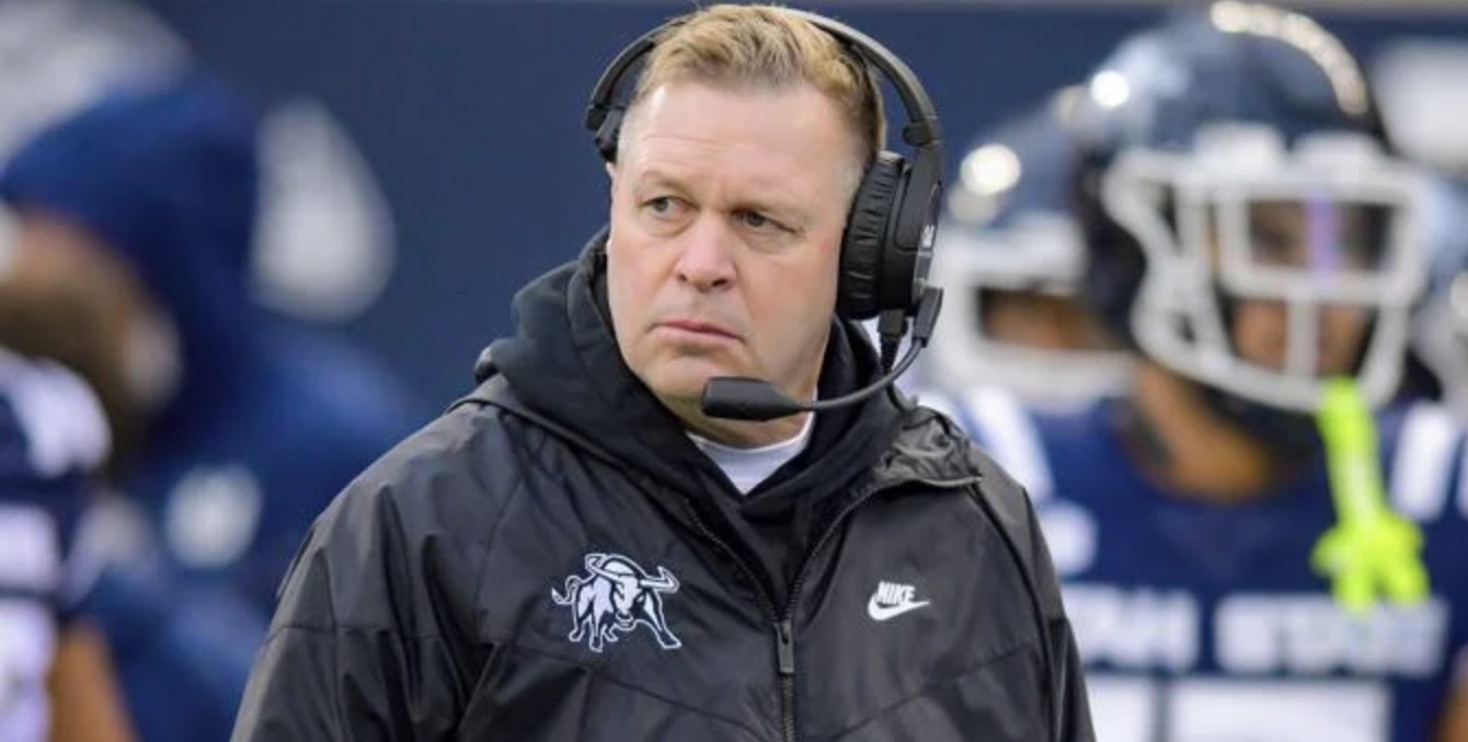 Utah State head coach Bronco Mendenhall watches the game in the first half, Friday in Logan.