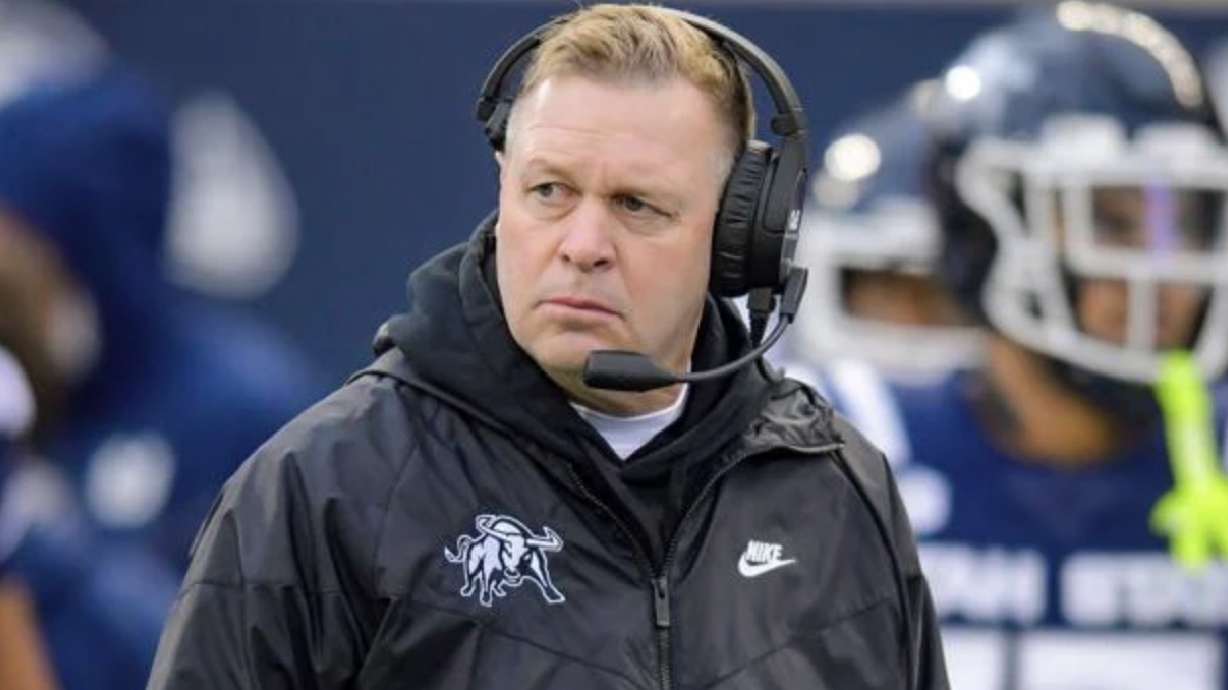 Utah State head coach Bronco Mendenhall watches the game in the first half, Friday in Logan.