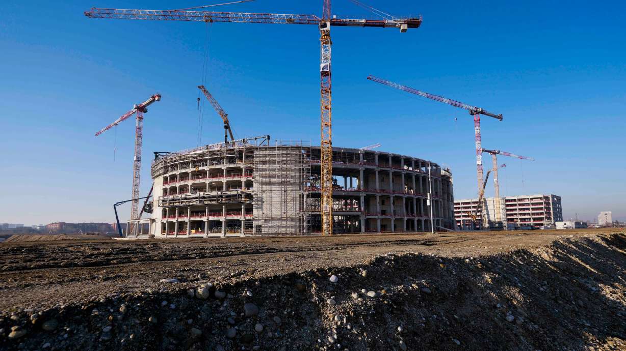 FILE - Construction continues at the Milano Santagiulia Ice Hockey Arena for the Milan Cortina 2026 Winter Olympics in Milan, Italy, Wednesday, Jan. 15, 2025.