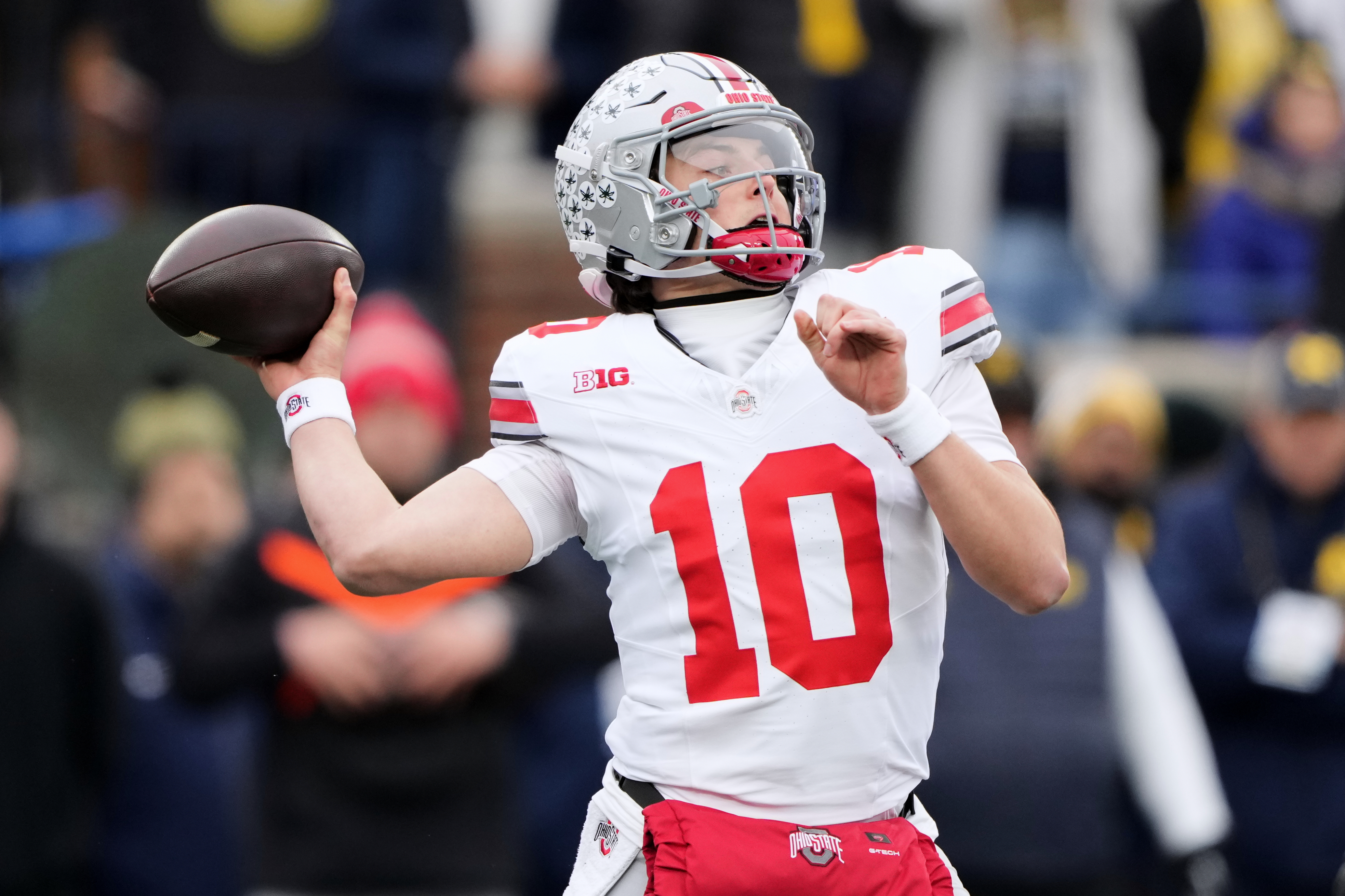 Ohio State quarterback Julian Sayin throws during the first half of an NCAA college football game against Michigan, Saturday, Nov. 29, 2025, in Ann Arbor, Mich. 