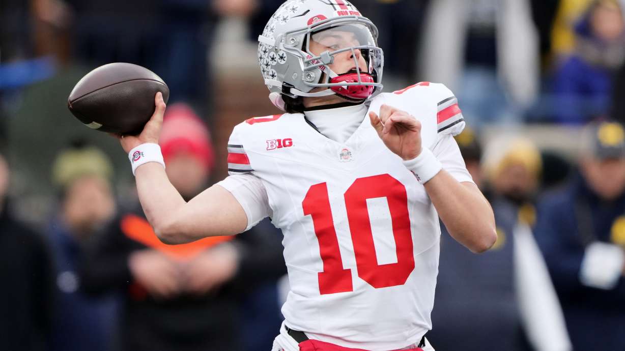 Ohio State quarterback Julian Sayin throws during the first half of an NCAA college football game against Michigan, Saturday, Nov. 29, 2025, in Ann Arbor, Mich.