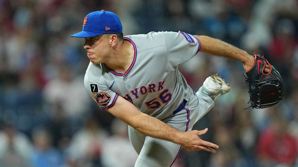 FILE - New York Mets pitcher Ryan Helsley throws during the eighth inning of a baseball game Sept. 10, 2025, in Philadelphia.